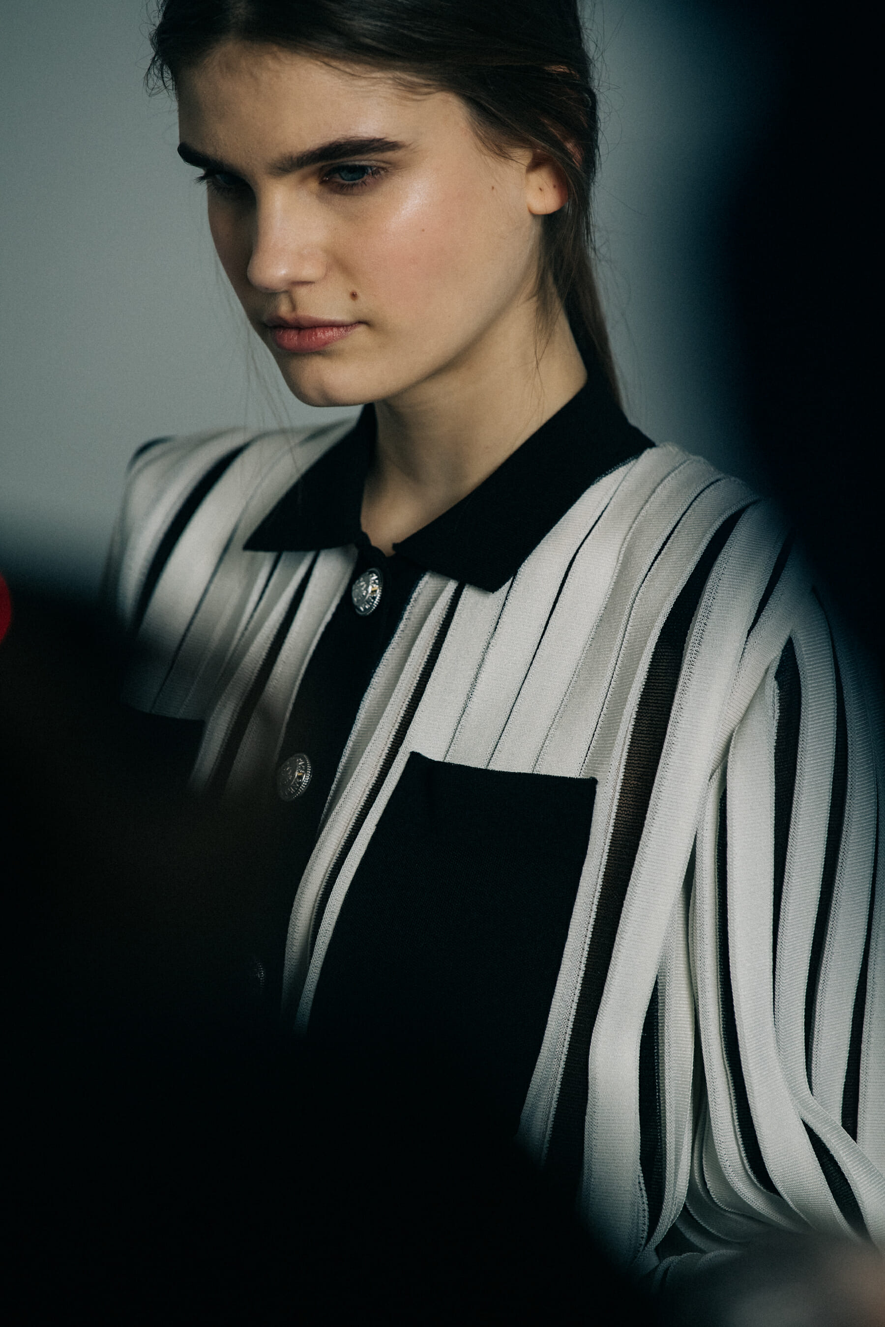 Models wearing black backstage at Balmain