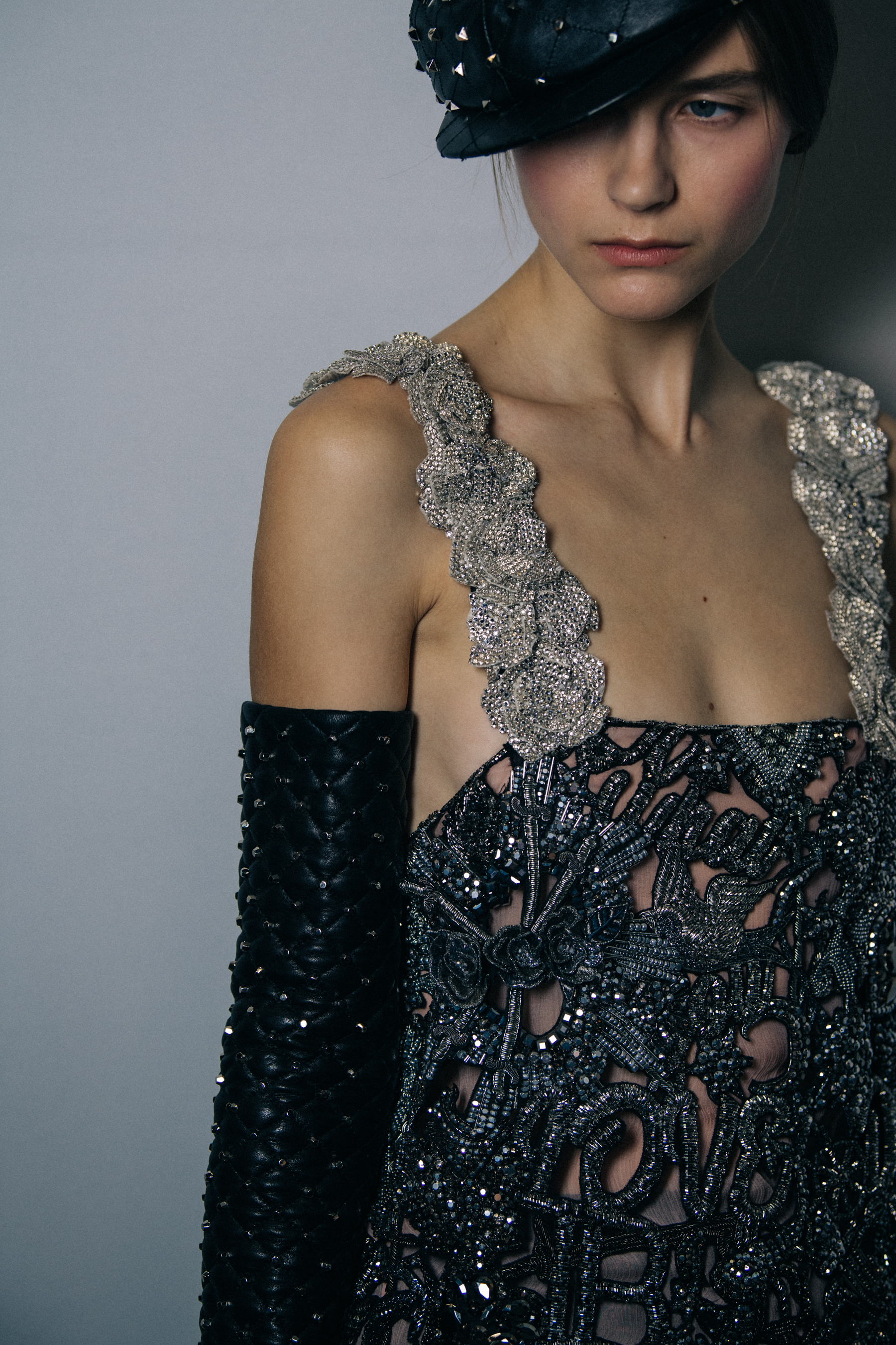 Models wearing studs backstage at Balmain