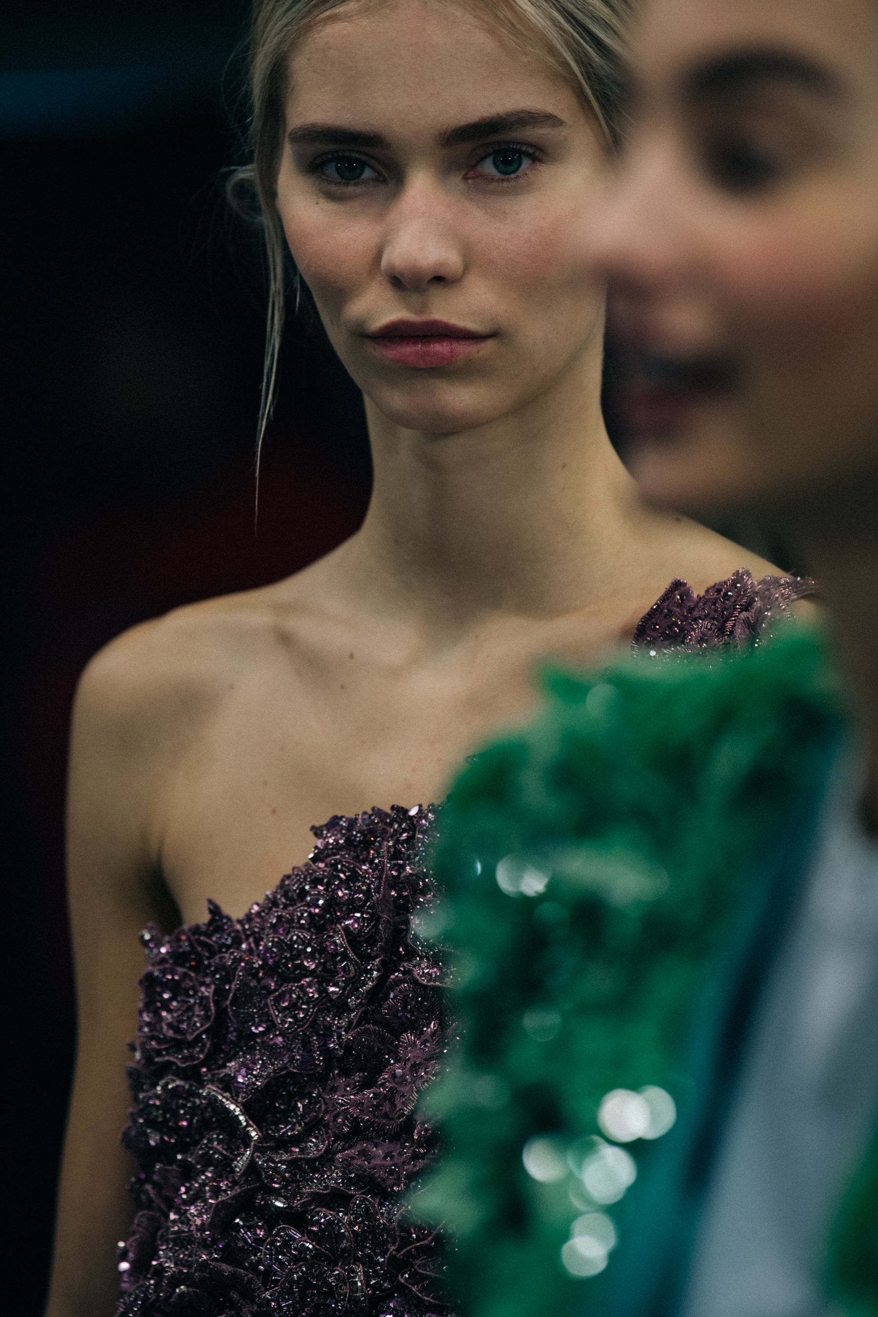 Model wearing purple dress at Balmain