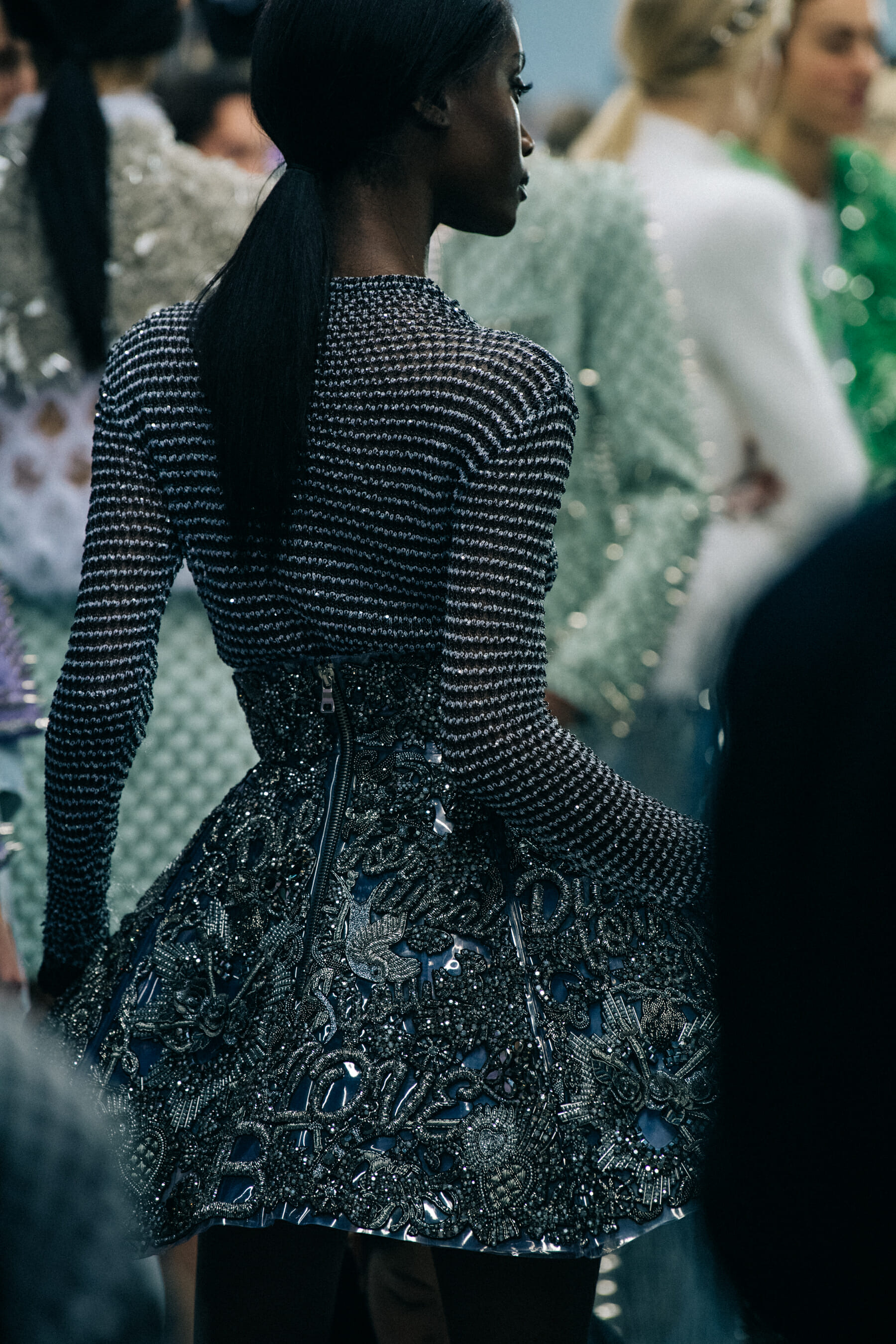 Models wearing studs backstage at Balmain