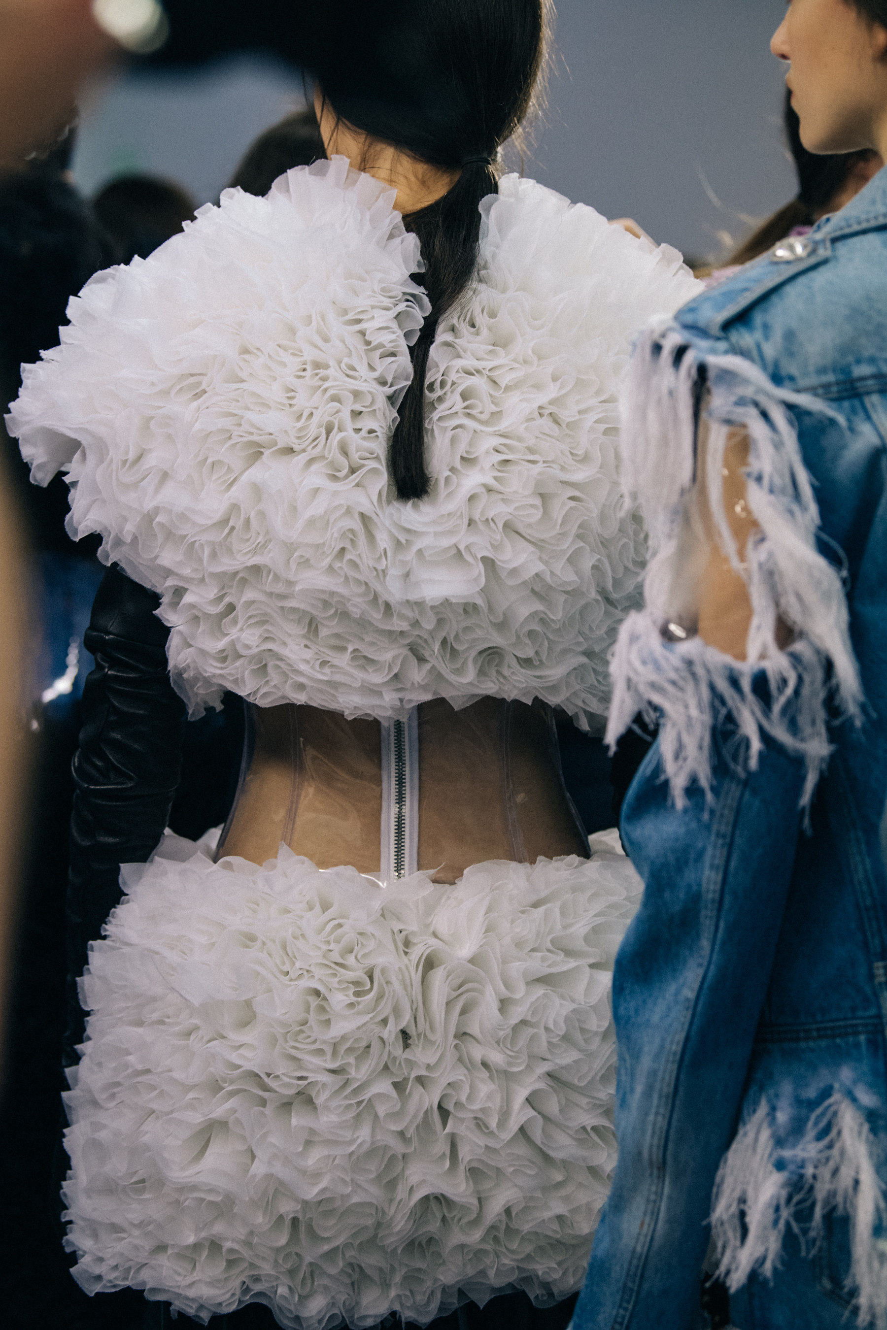 Models wearing studs backstage at Balmain