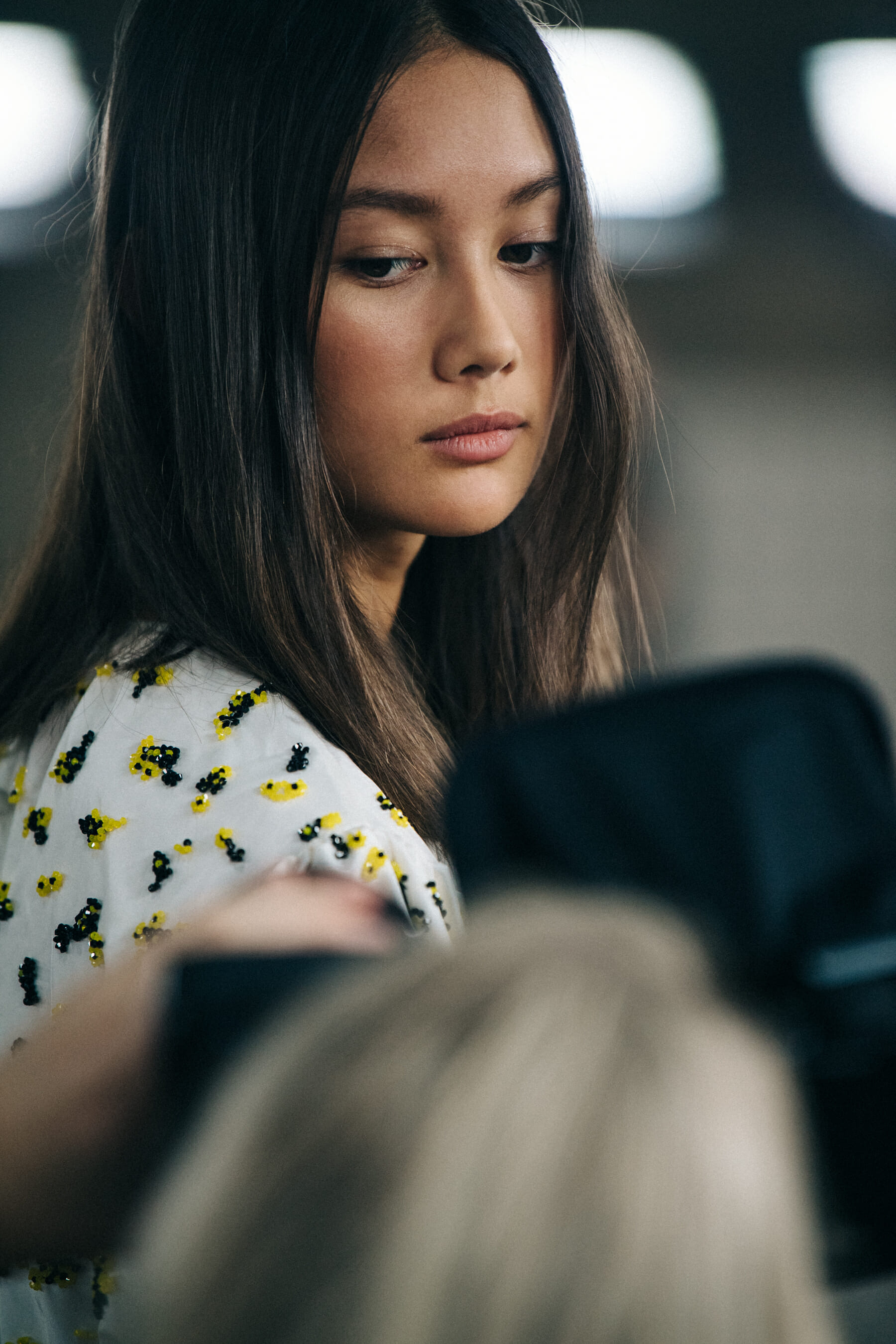 Model wearing white dress at Cecilie Bahnsen