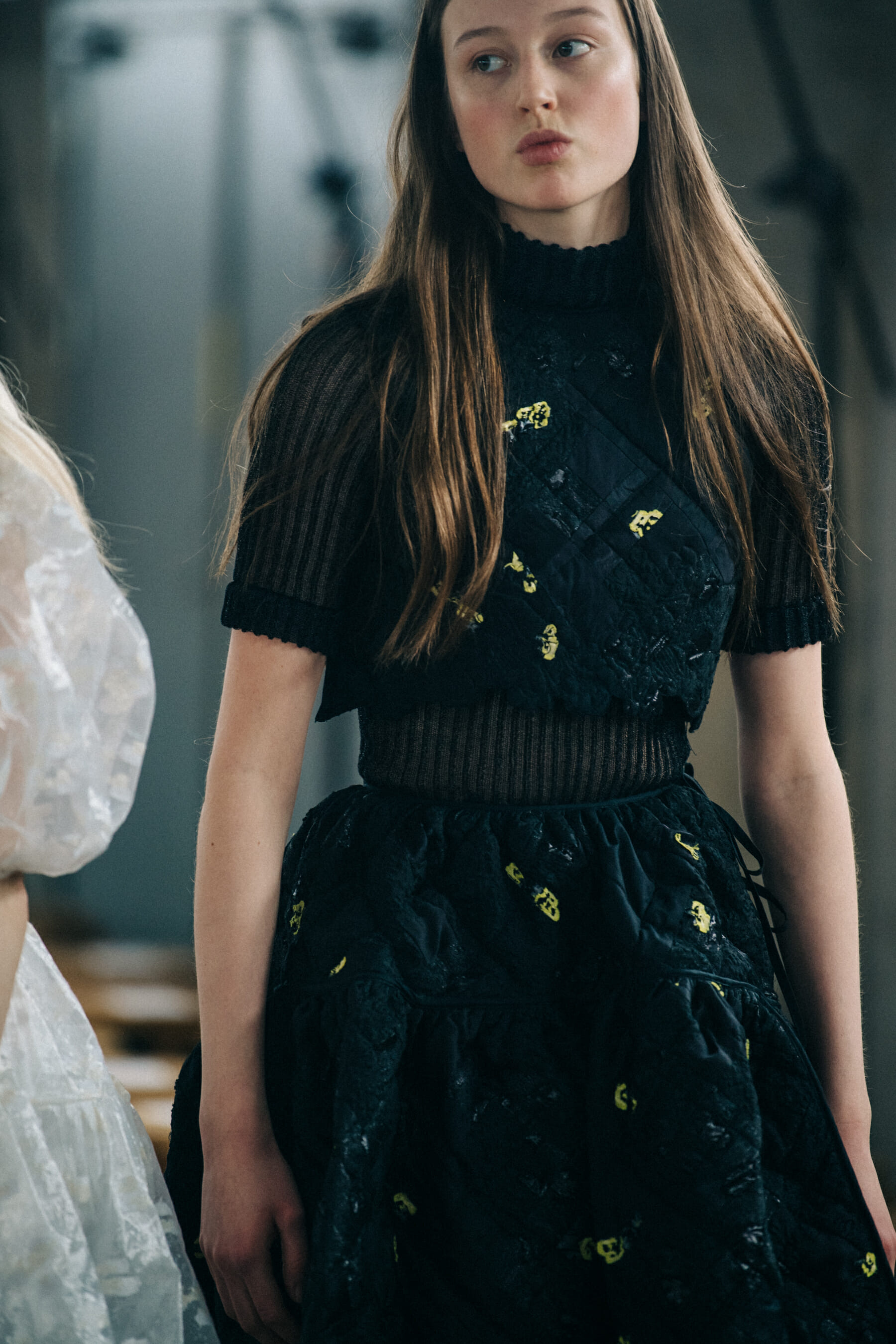 Model wearing black dress at Cecilie Bahnsen