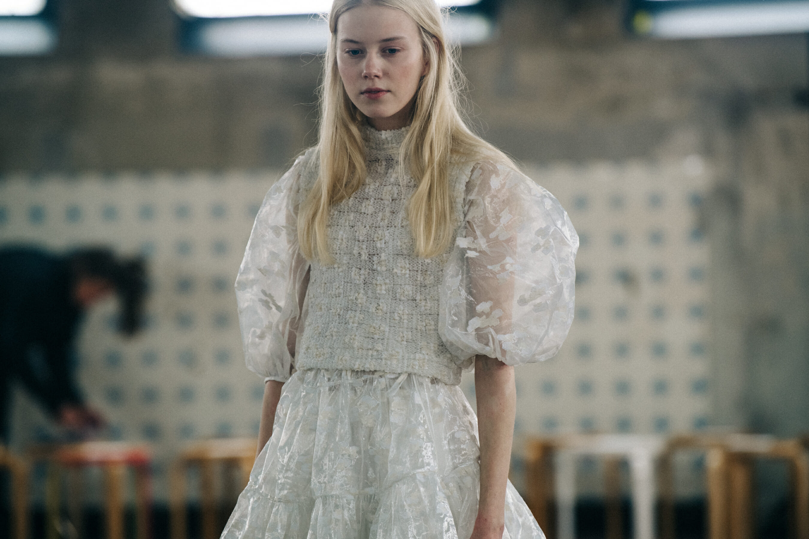 Model wearing white dress at Cecilie Bahnsen
