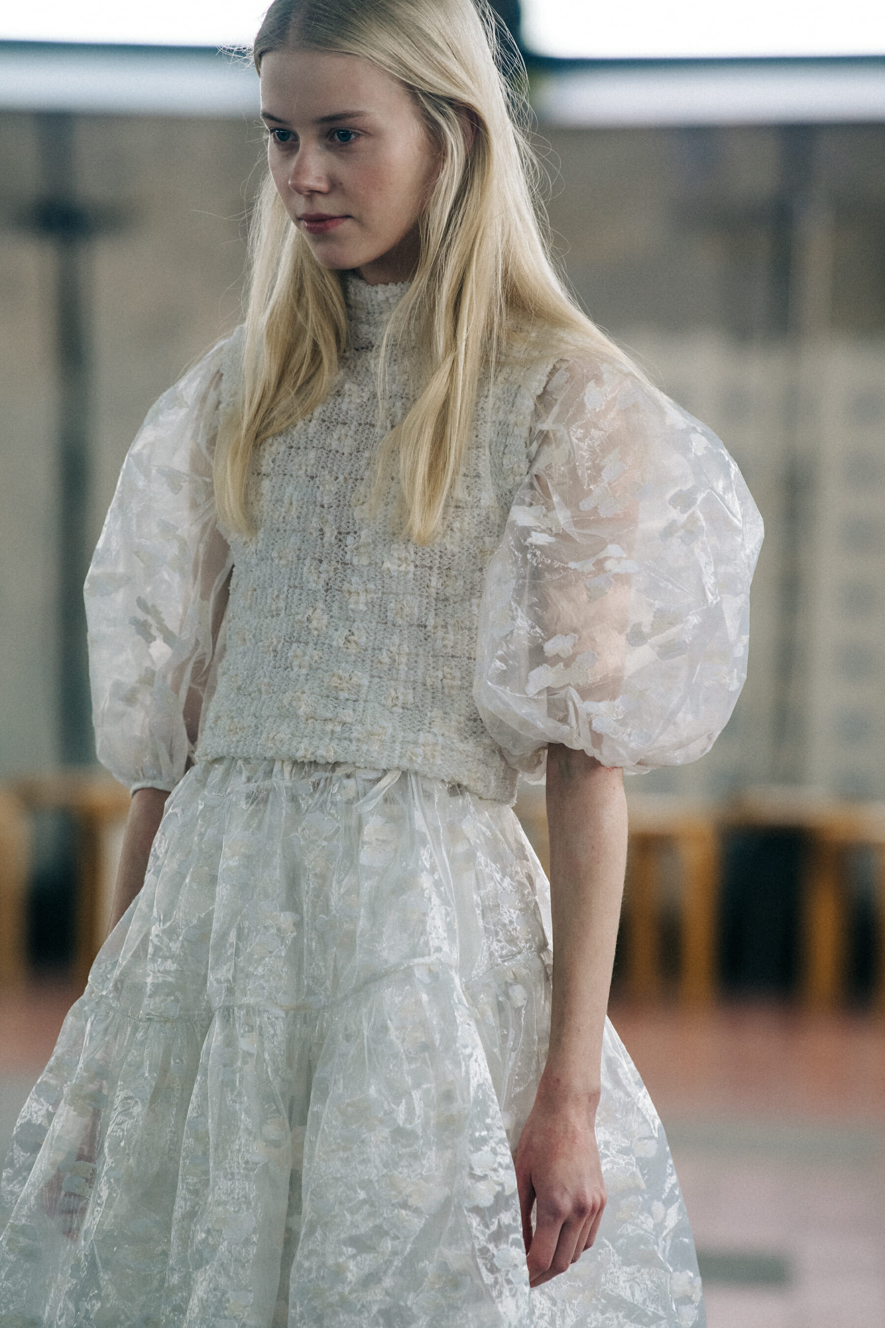 Model wearing white dress at Cecilie Bahnsen