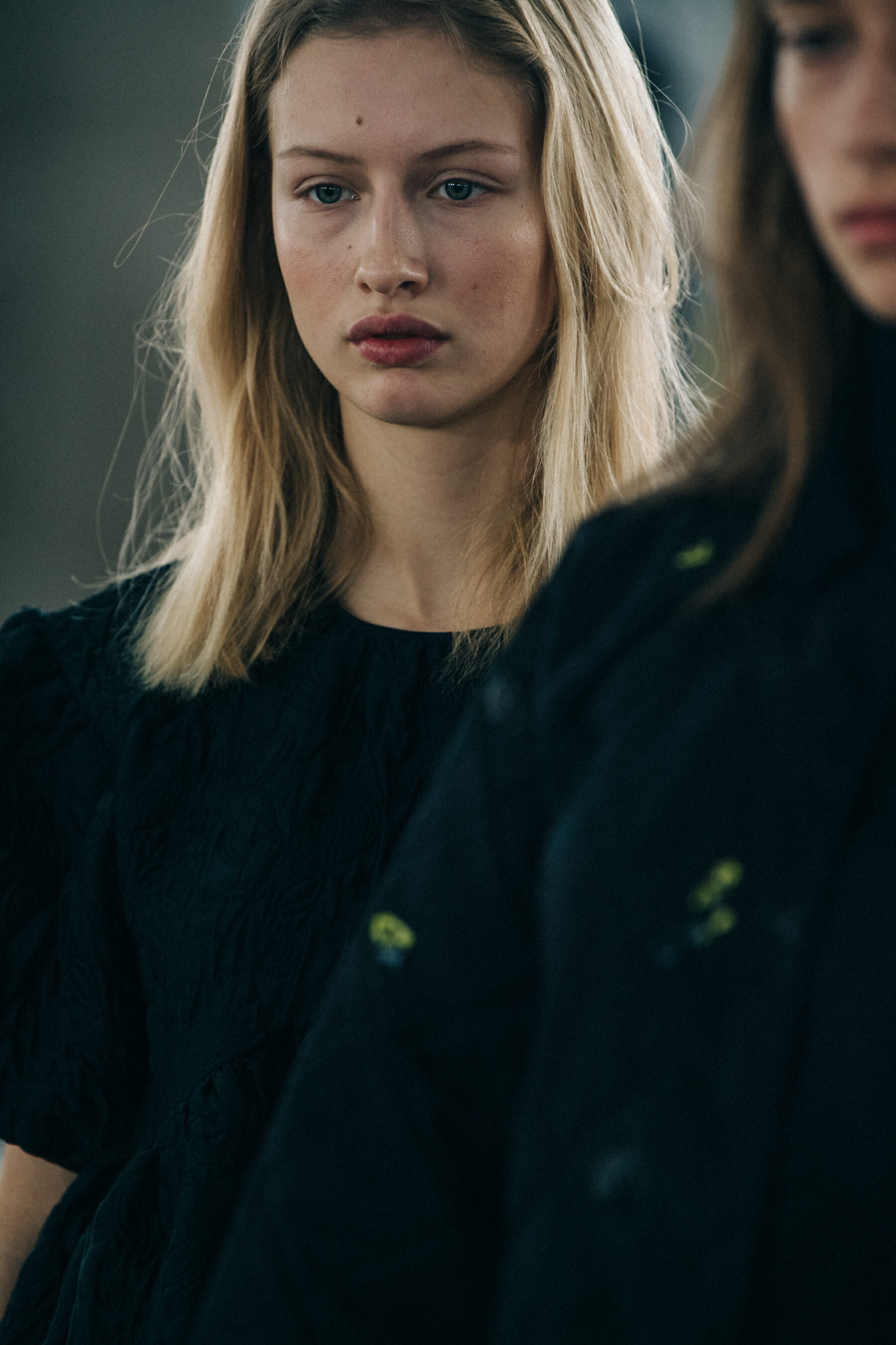 Model wearing black dress at Cecilie Bahnsen
