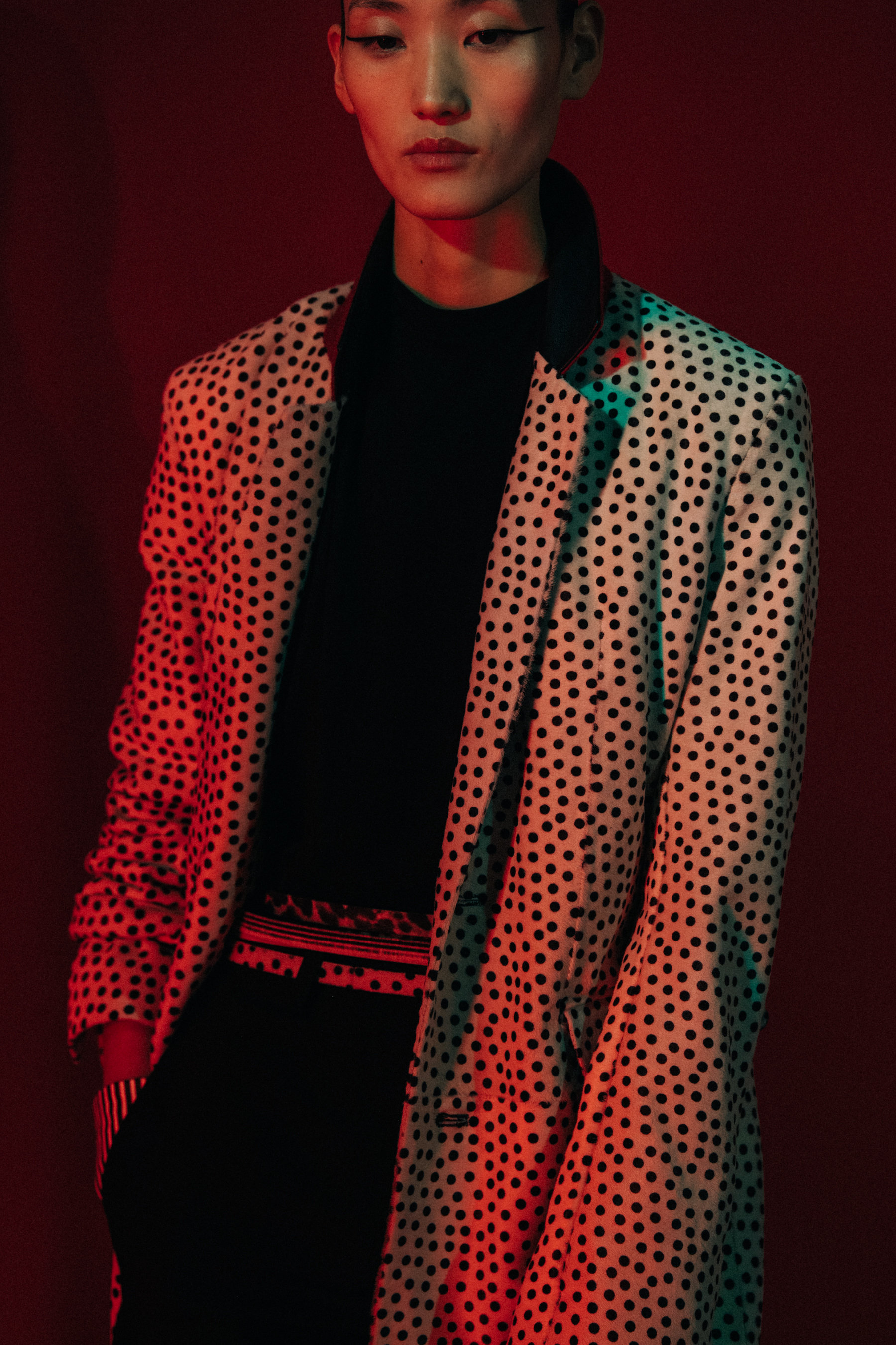 Model backstage wearing Haider Ackermann