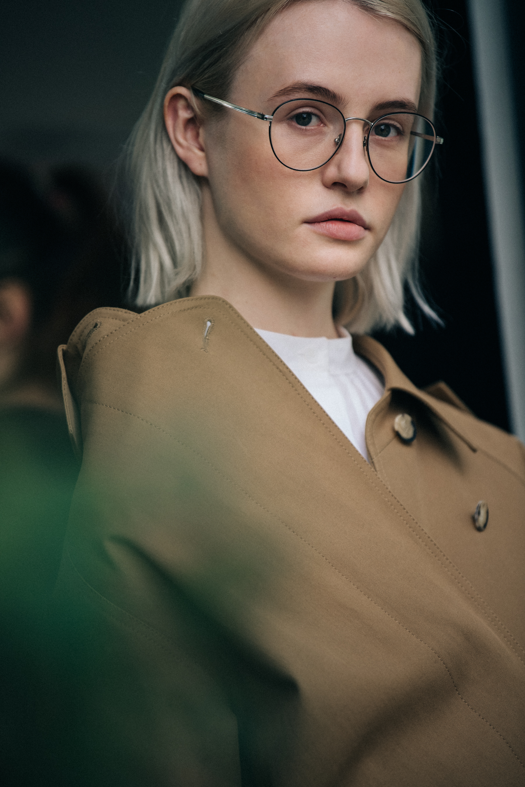 Model wearing tan backstage at Nehera