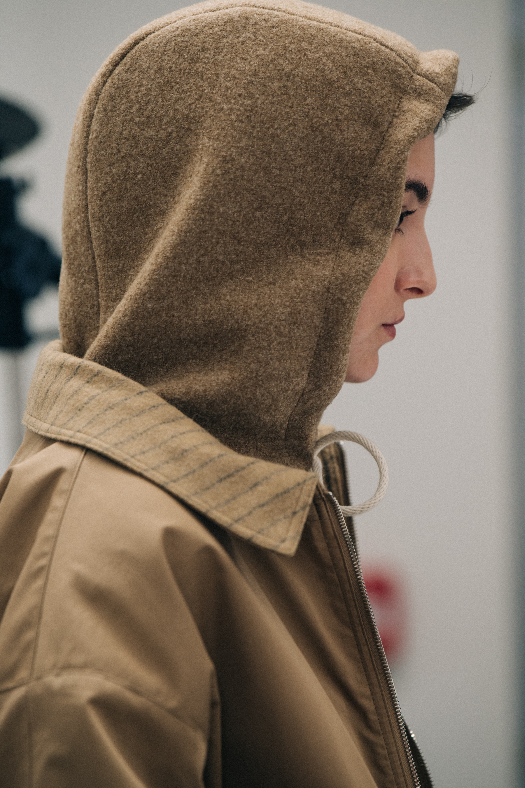 Model wearing tan backstage at Nehera
