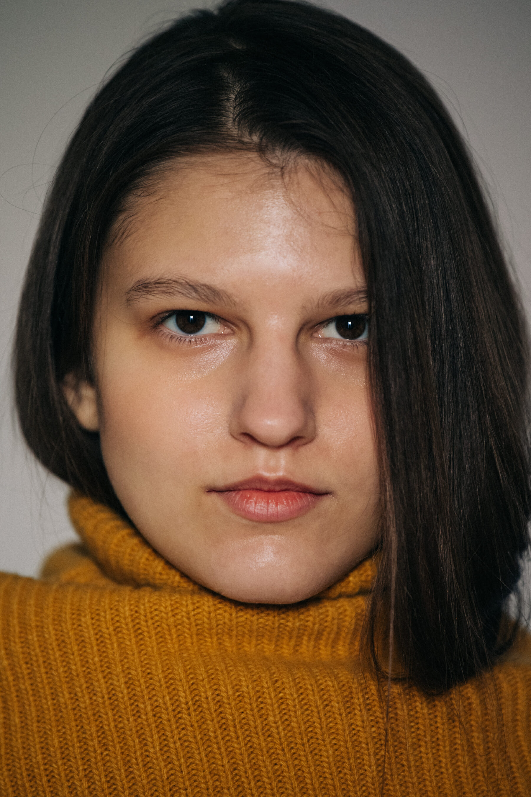 Portrait of model with long dark hair