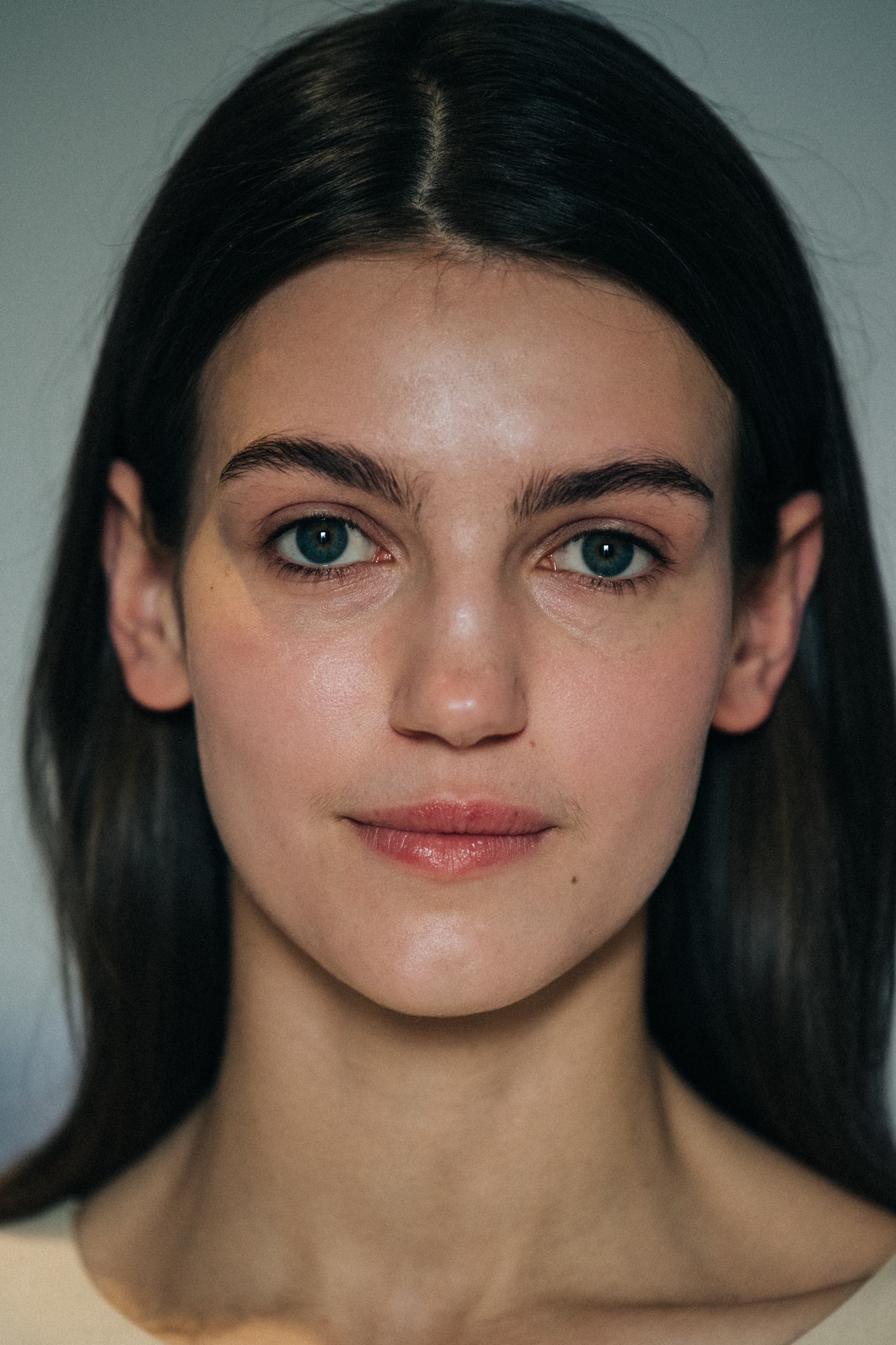 Portrait of model with long dark hair