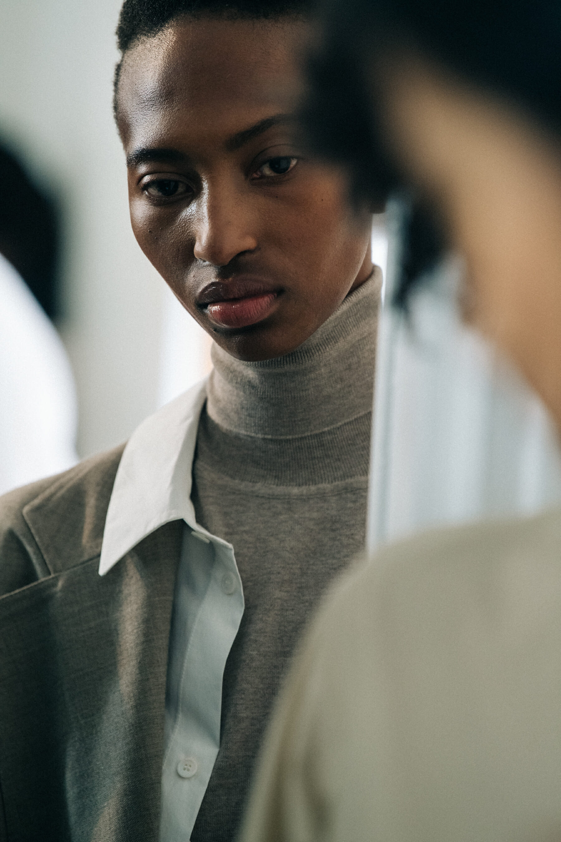 Model wearing wool backstage at Nehera