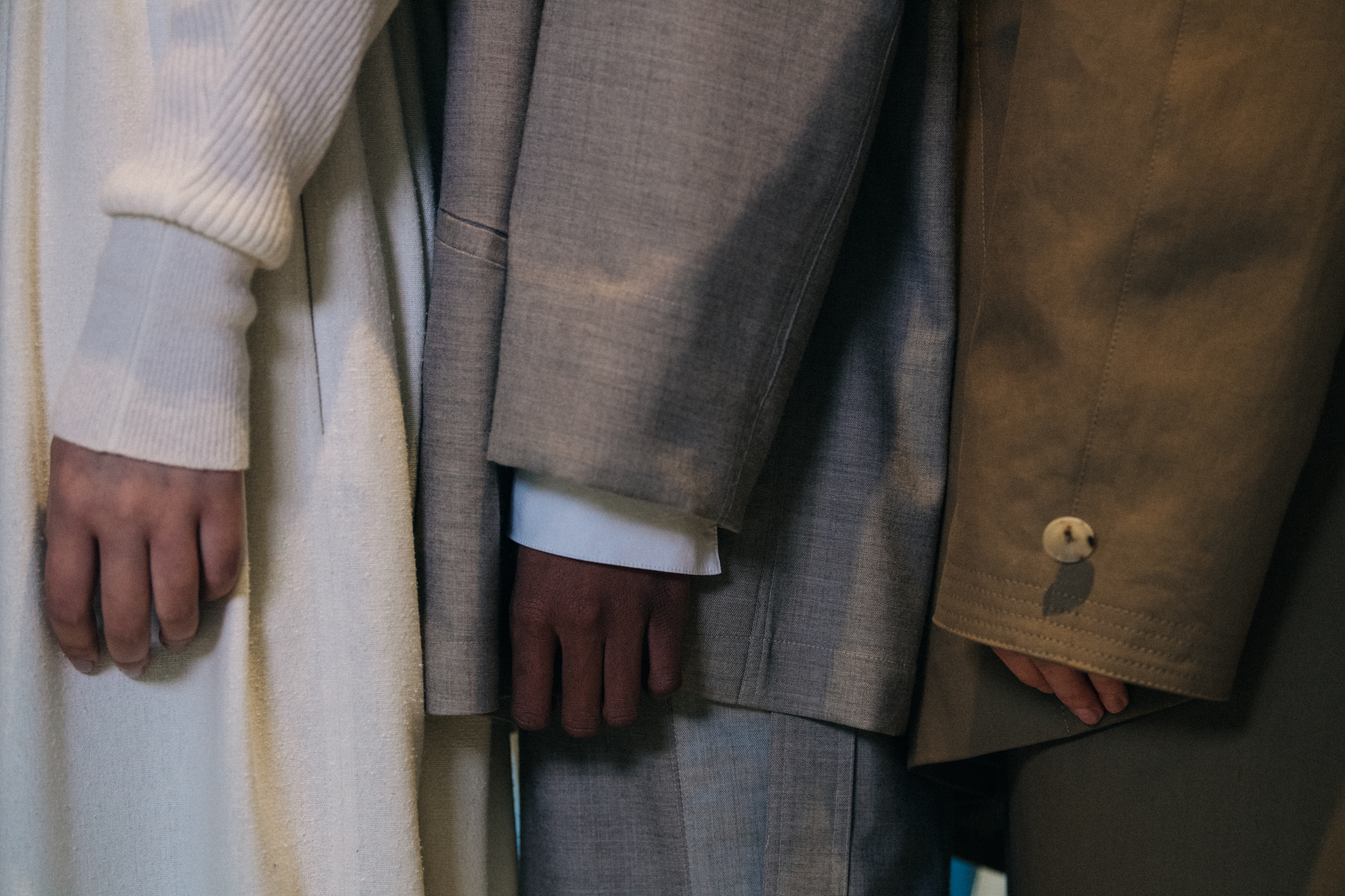 Model wearing tan backstage at Nehera