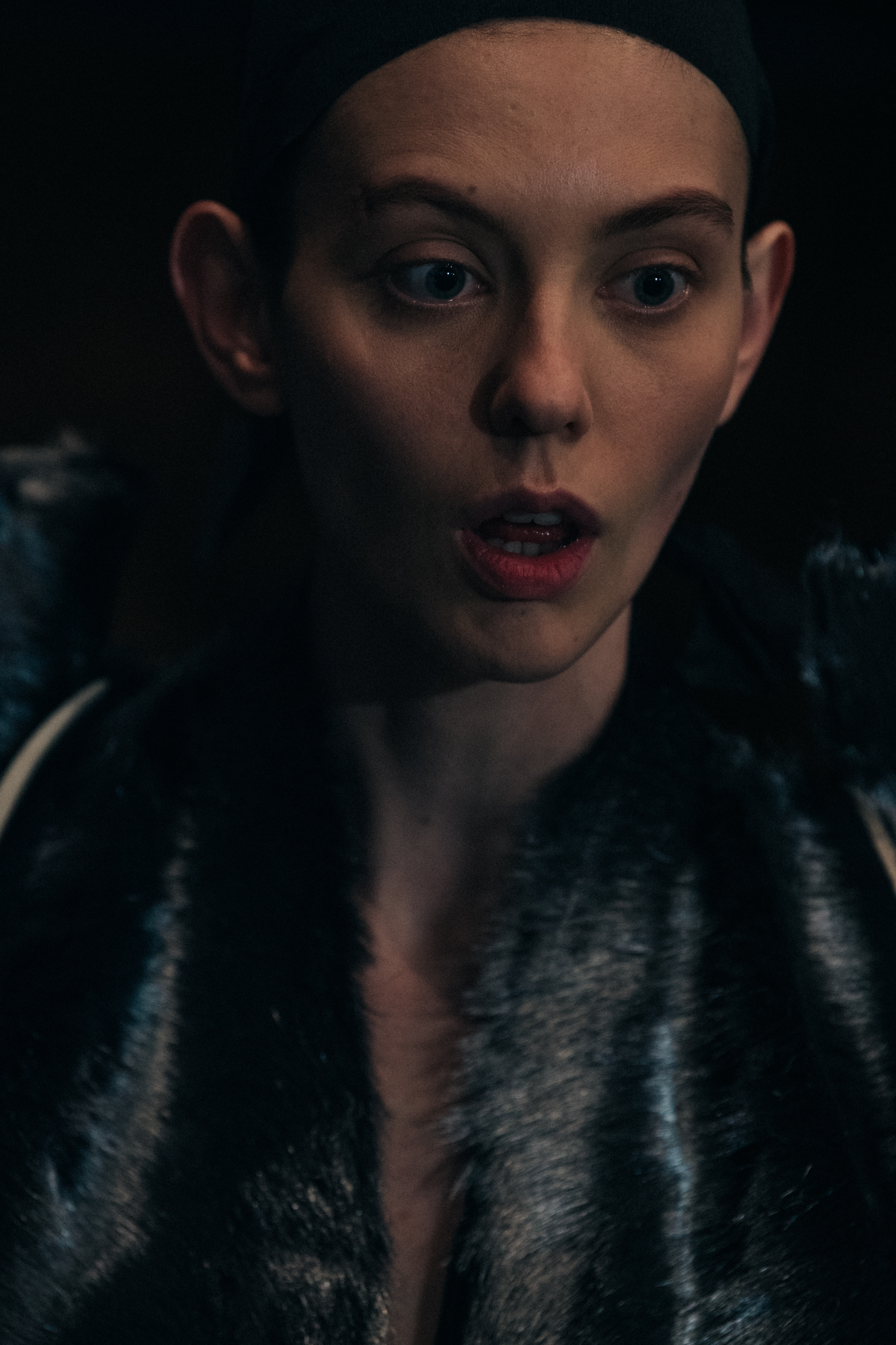 Model wearing fur backstage at Rick Owens