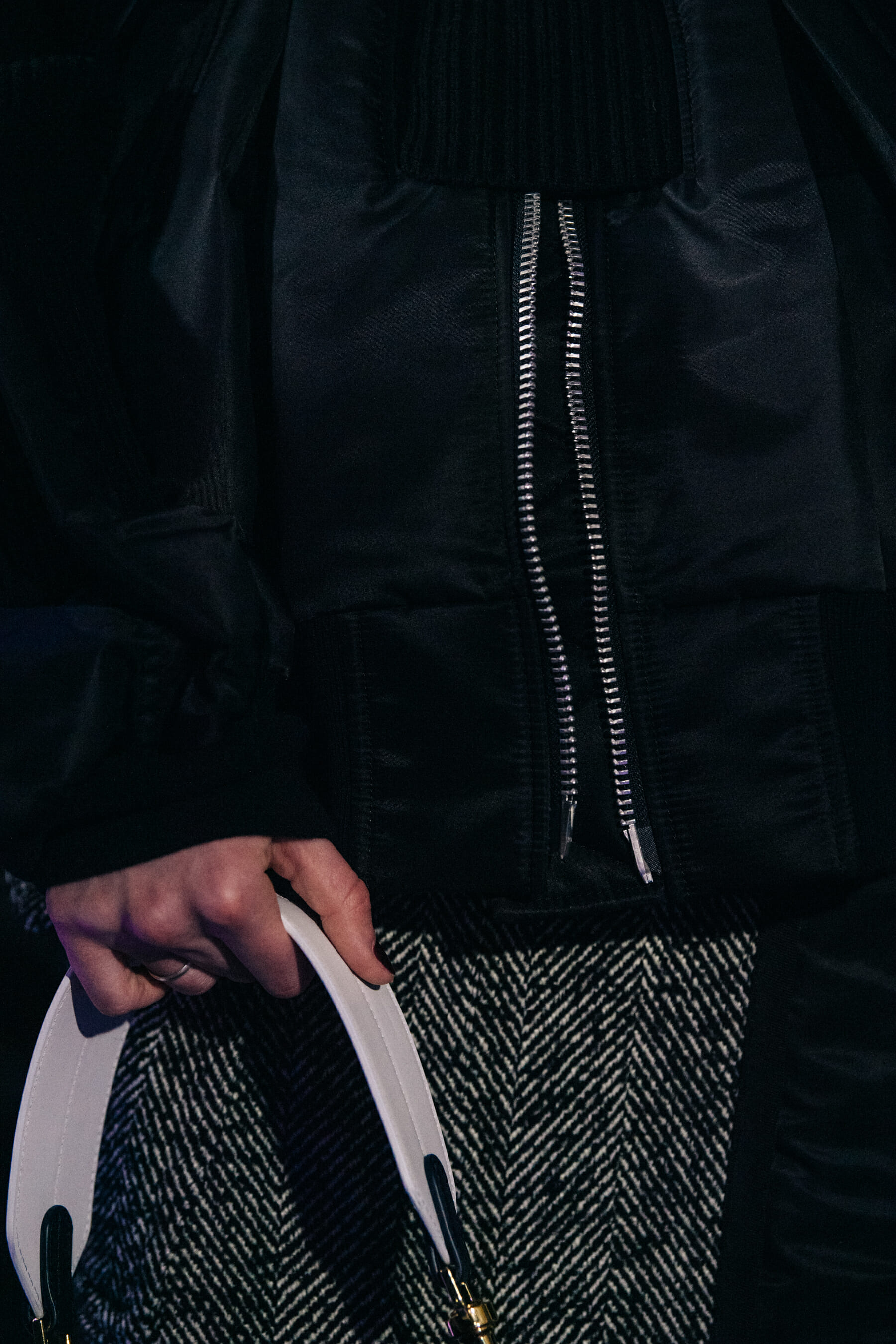 Model holding bag at Sacai