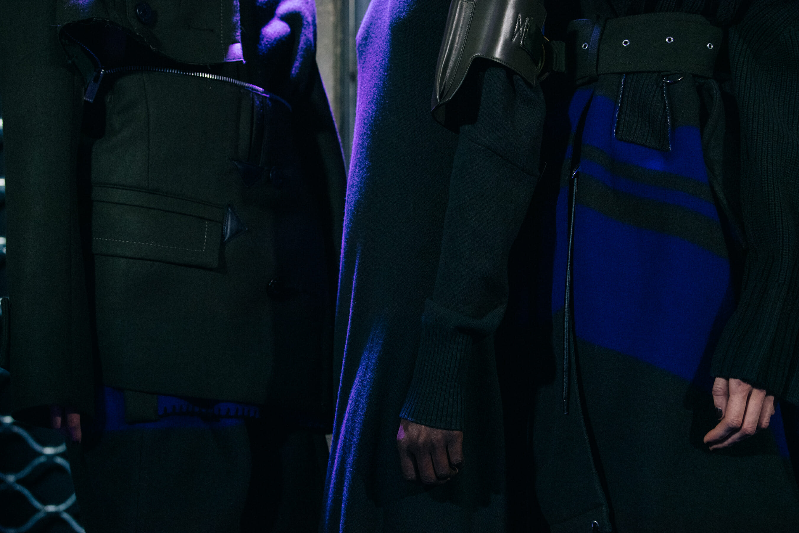 Models wearing black at Sacai