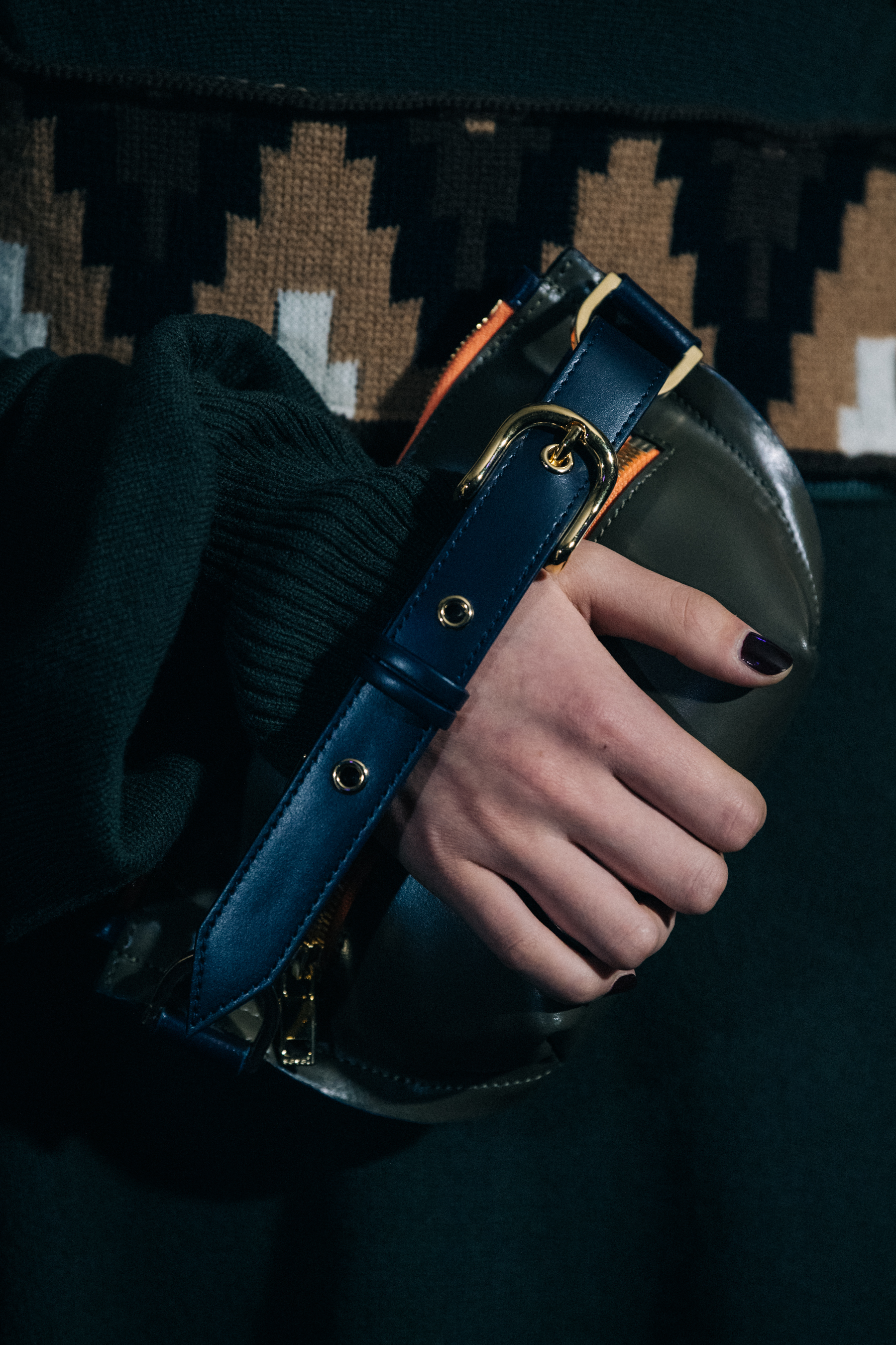 Model holding bag at Sacai