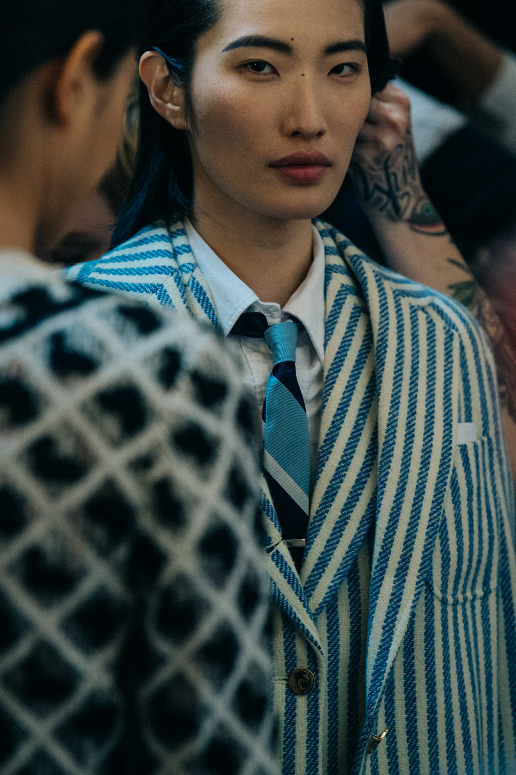 Models wearing Thom Browne suits