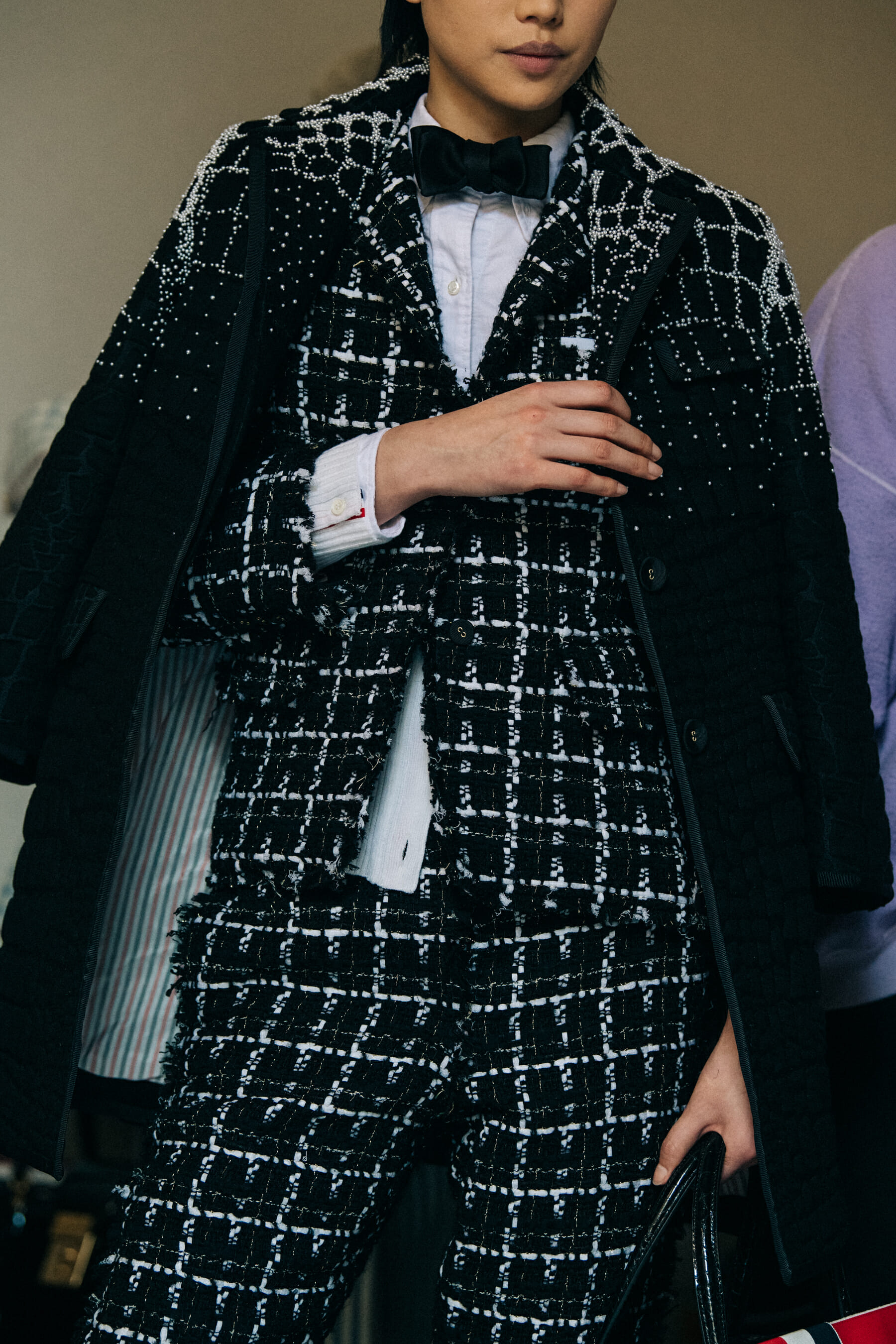 Models wearing Thom Browne suits