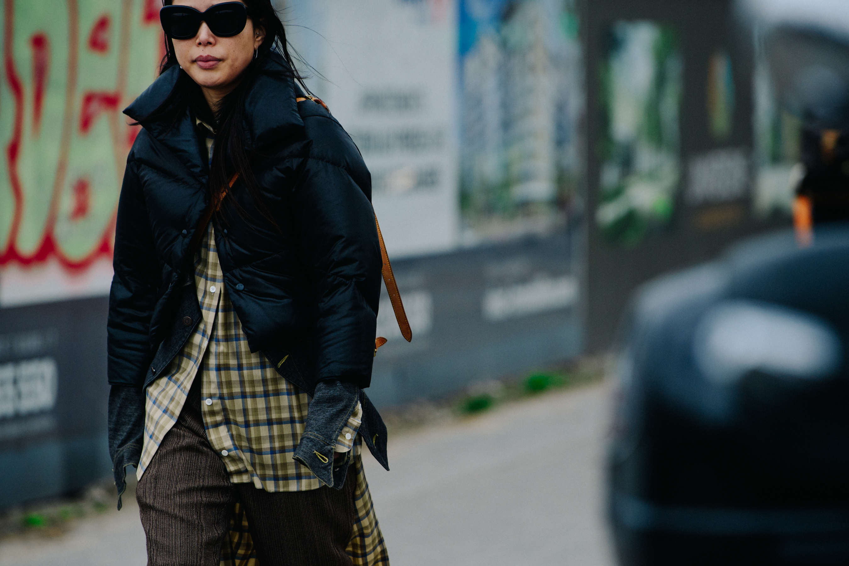 Woman wearing long check shirt