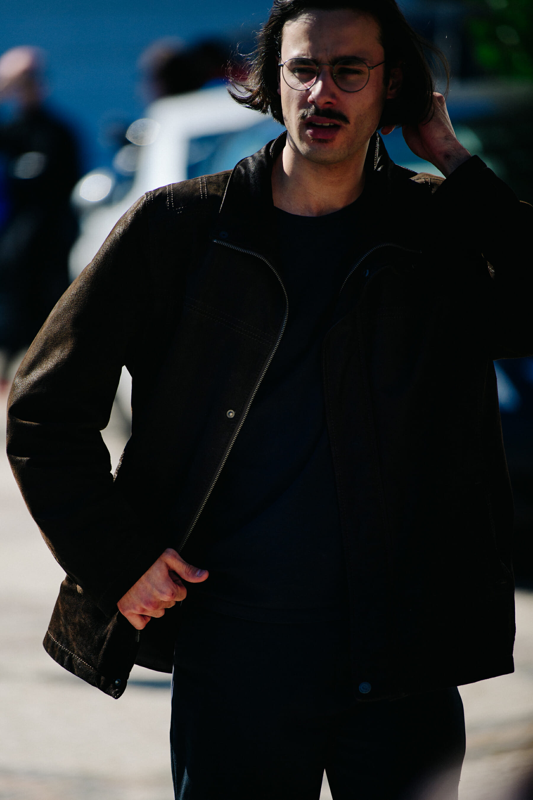 Man wearing brown jacket