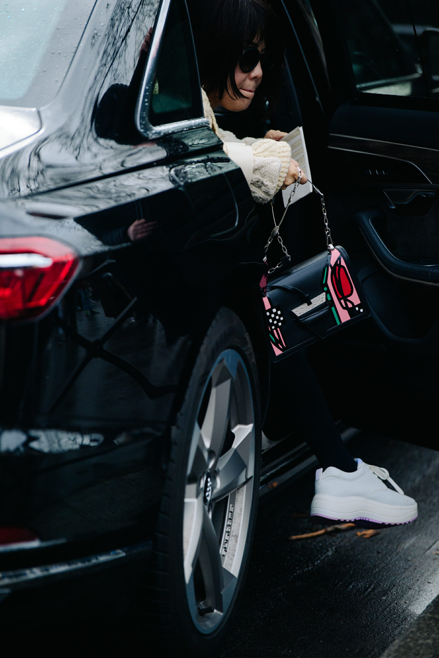 Woman wearing white sneakers