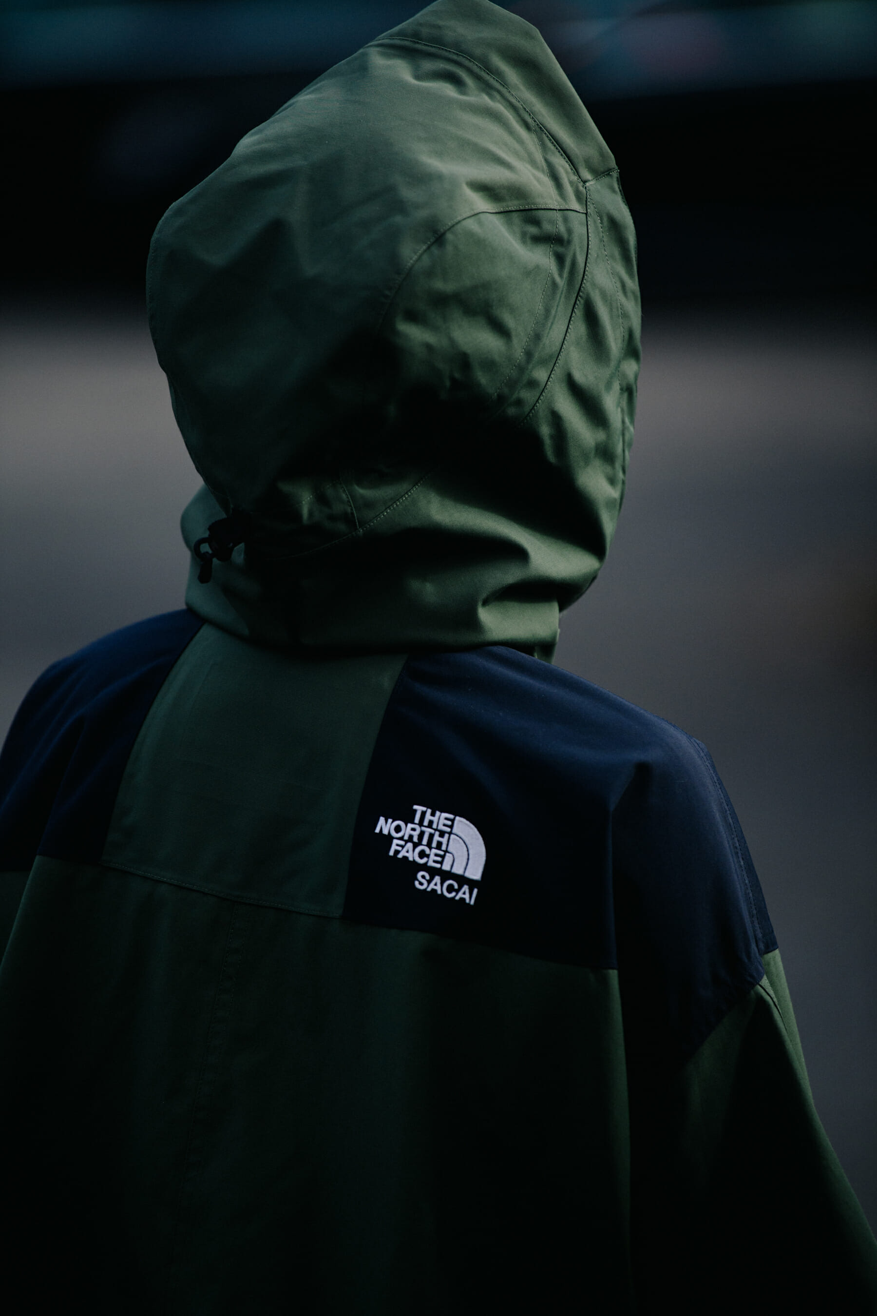 Woman wearing Sacai x The North Face jacket