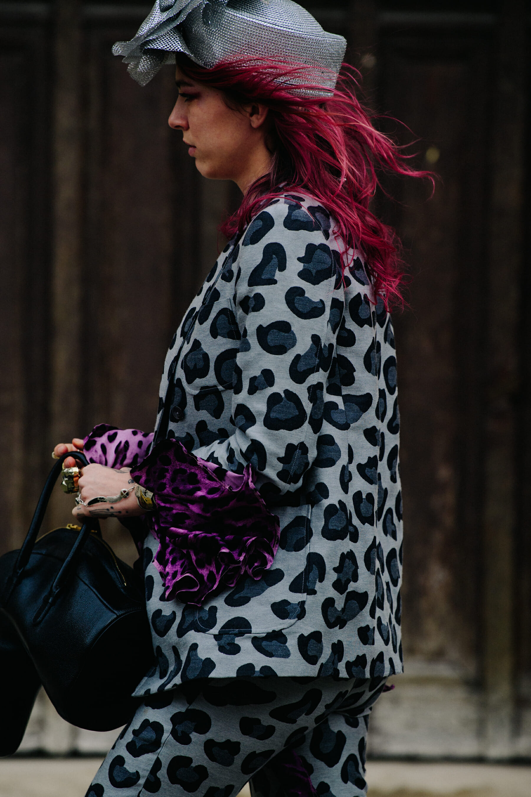 Woman wearing grey animal print outfit