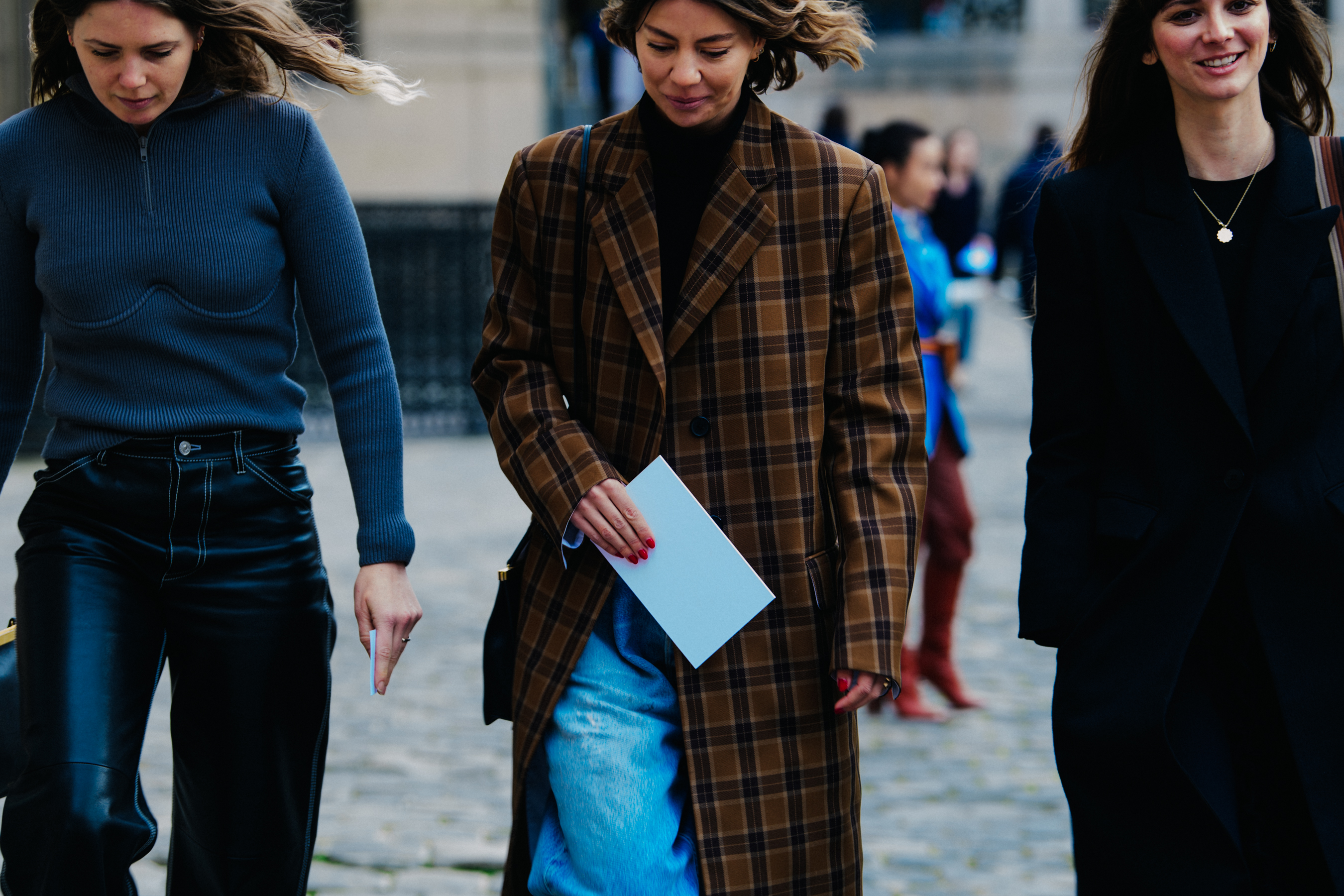 Three women wearing wool