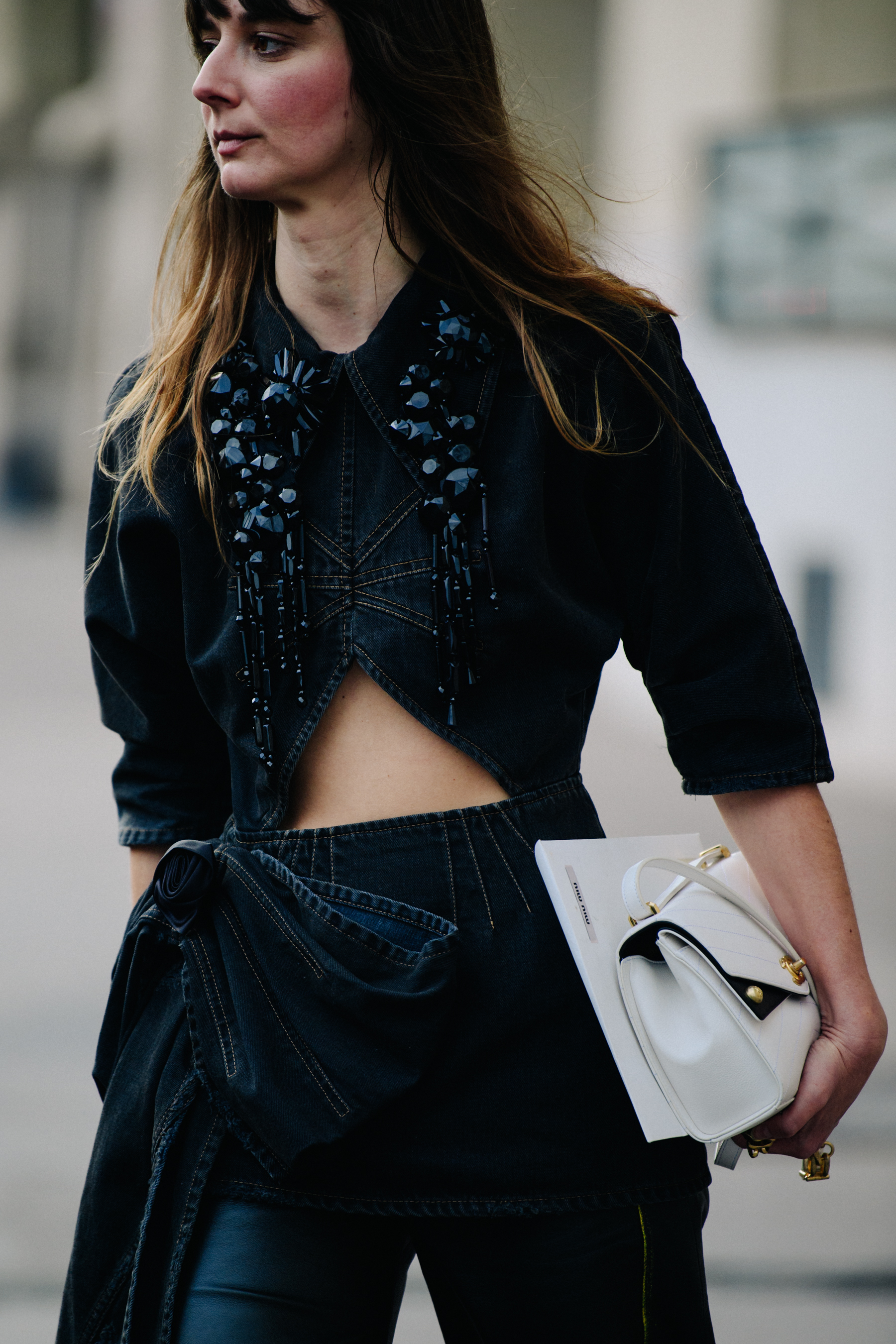Woman wearing black denim outfit