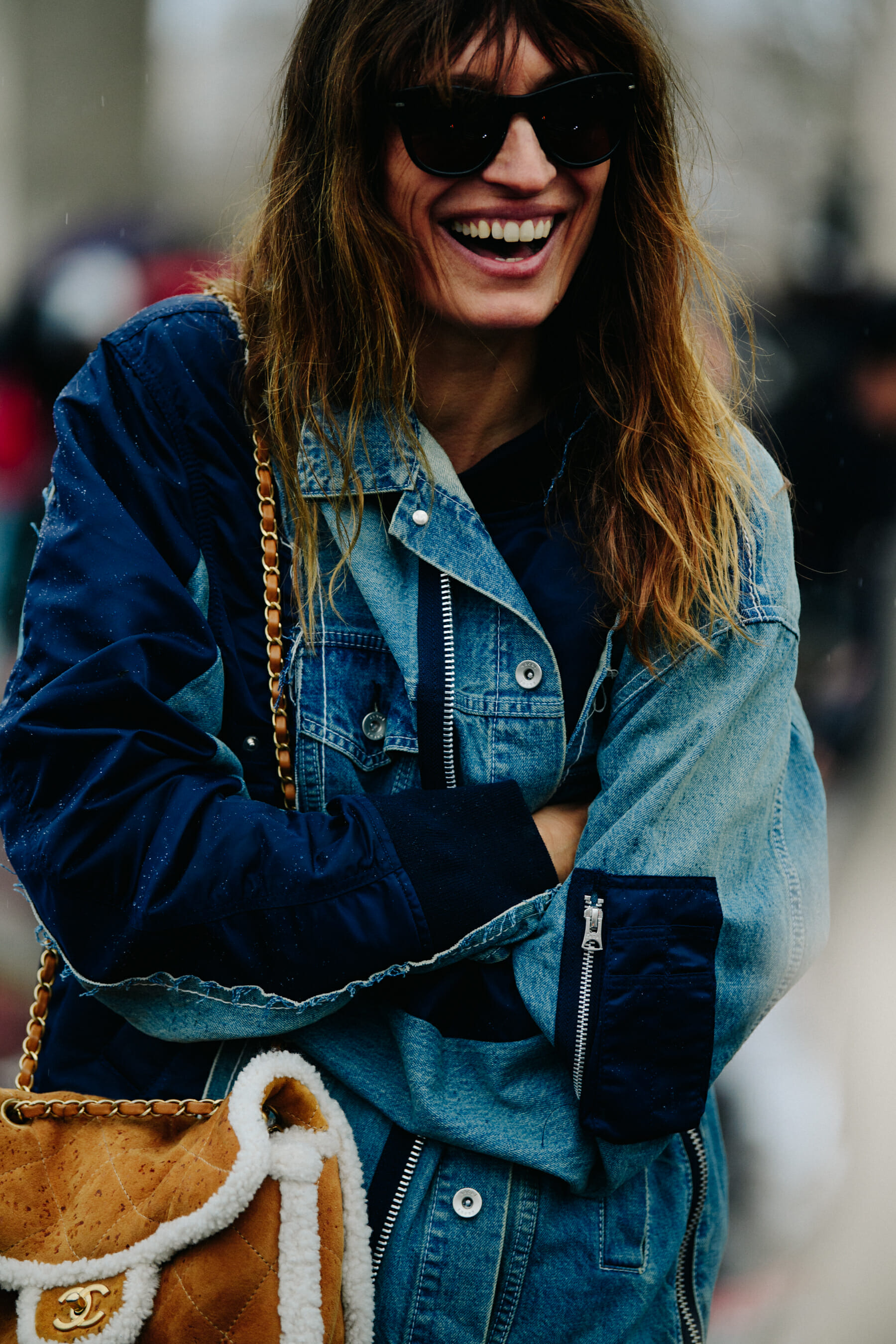 Woman carrying Chanel bag