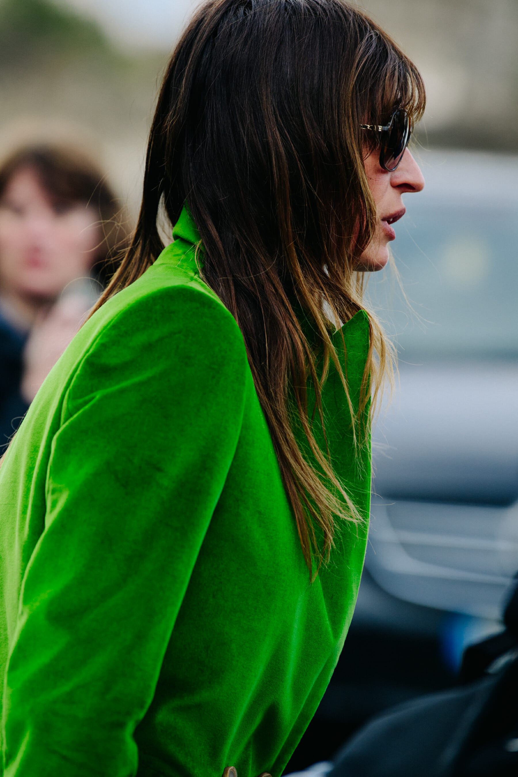 Woman wearing green velvet jacket