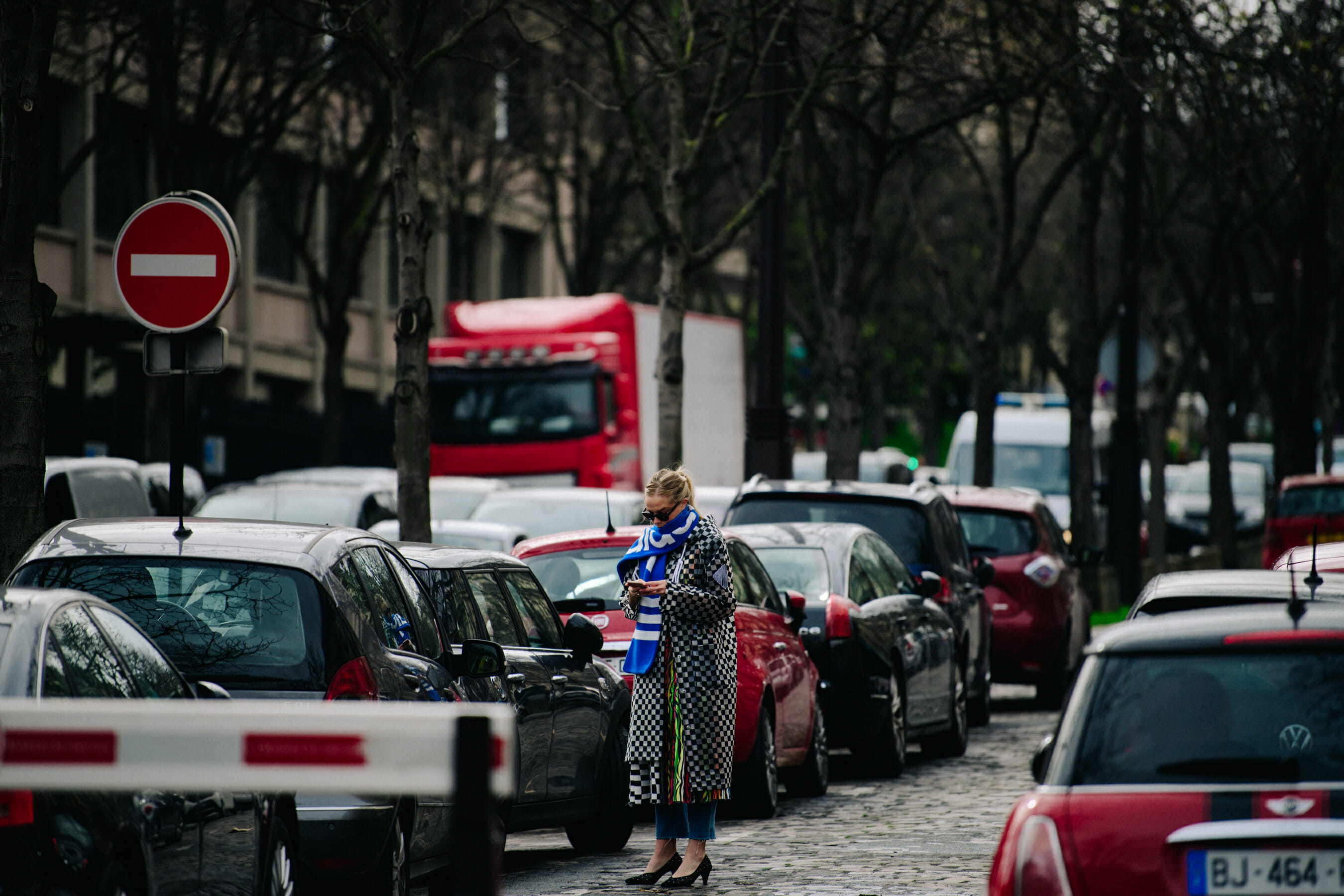 Woman wearing Adidas scarf