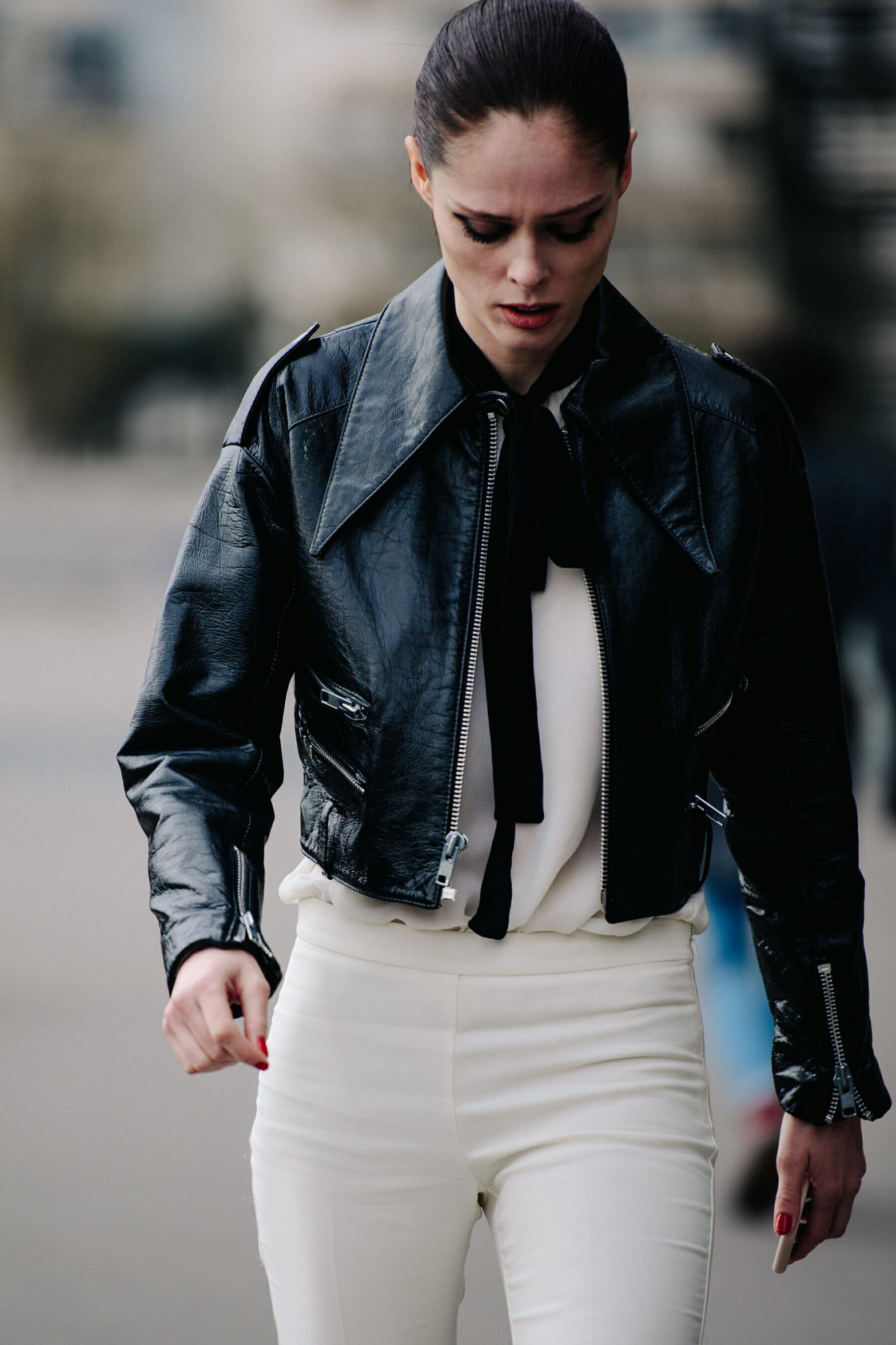 Woman wearing black leather jacket