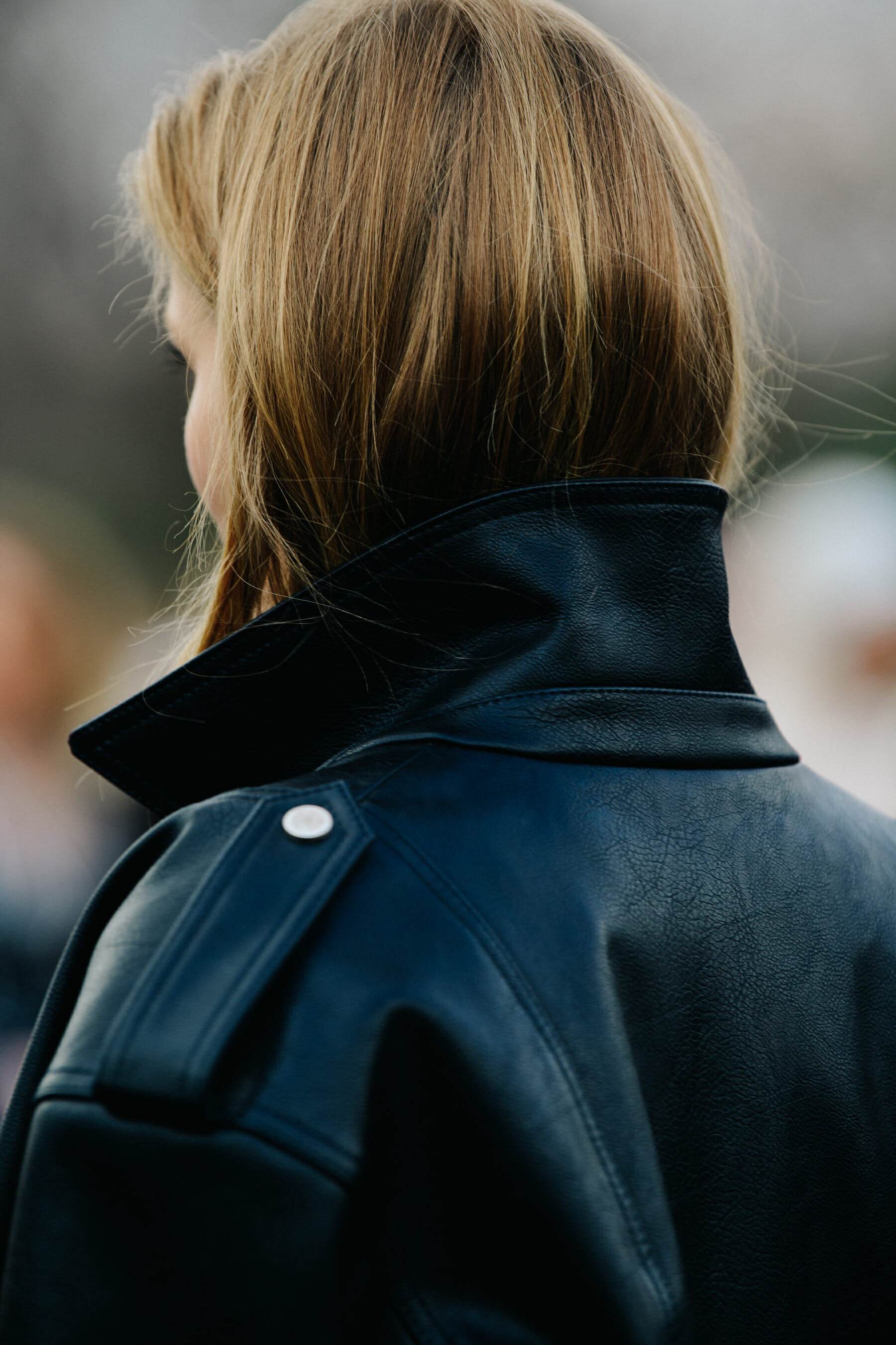 Russian woman wearing leather jacket
