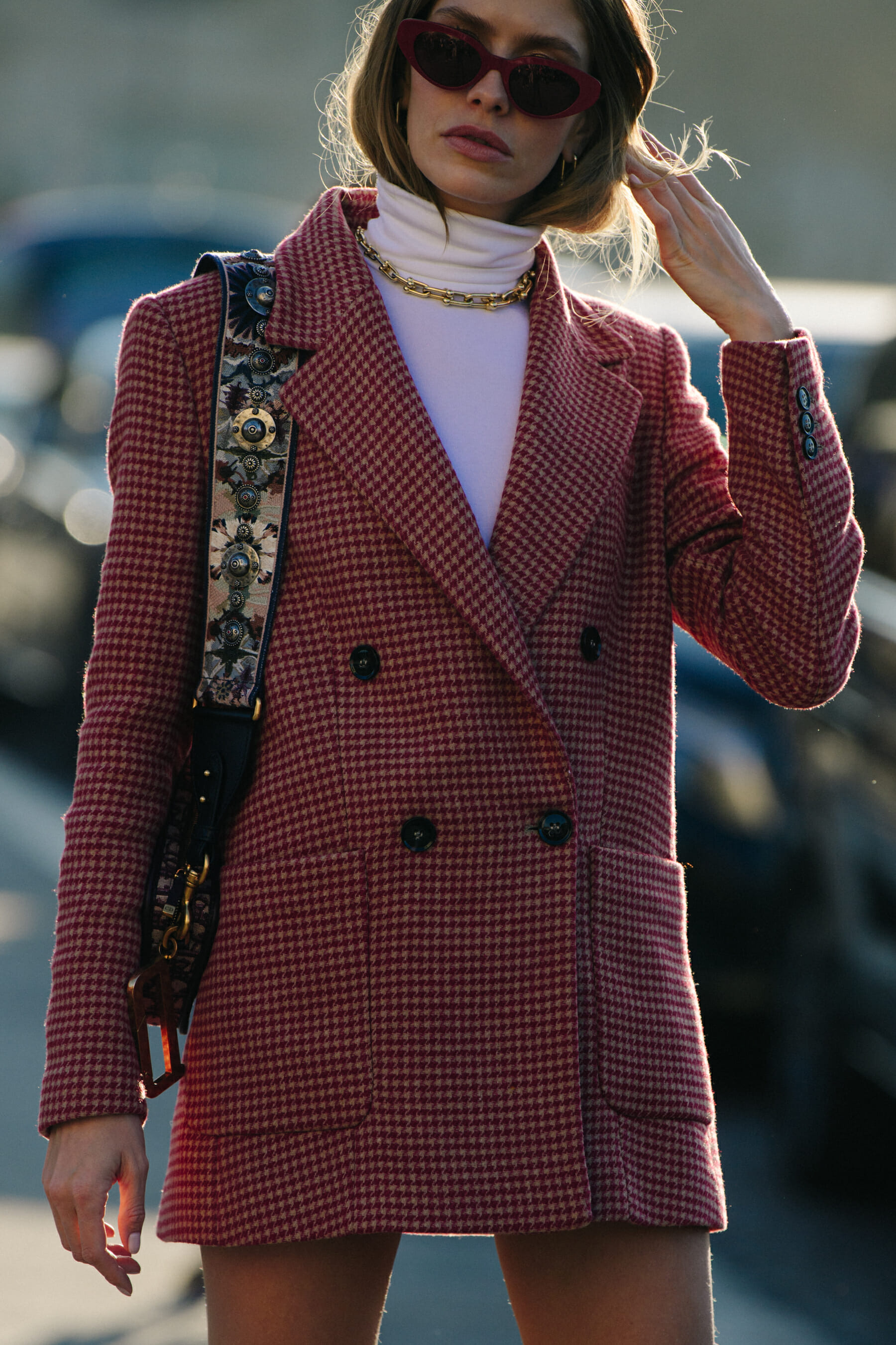 Woman wearing red pattern jacket