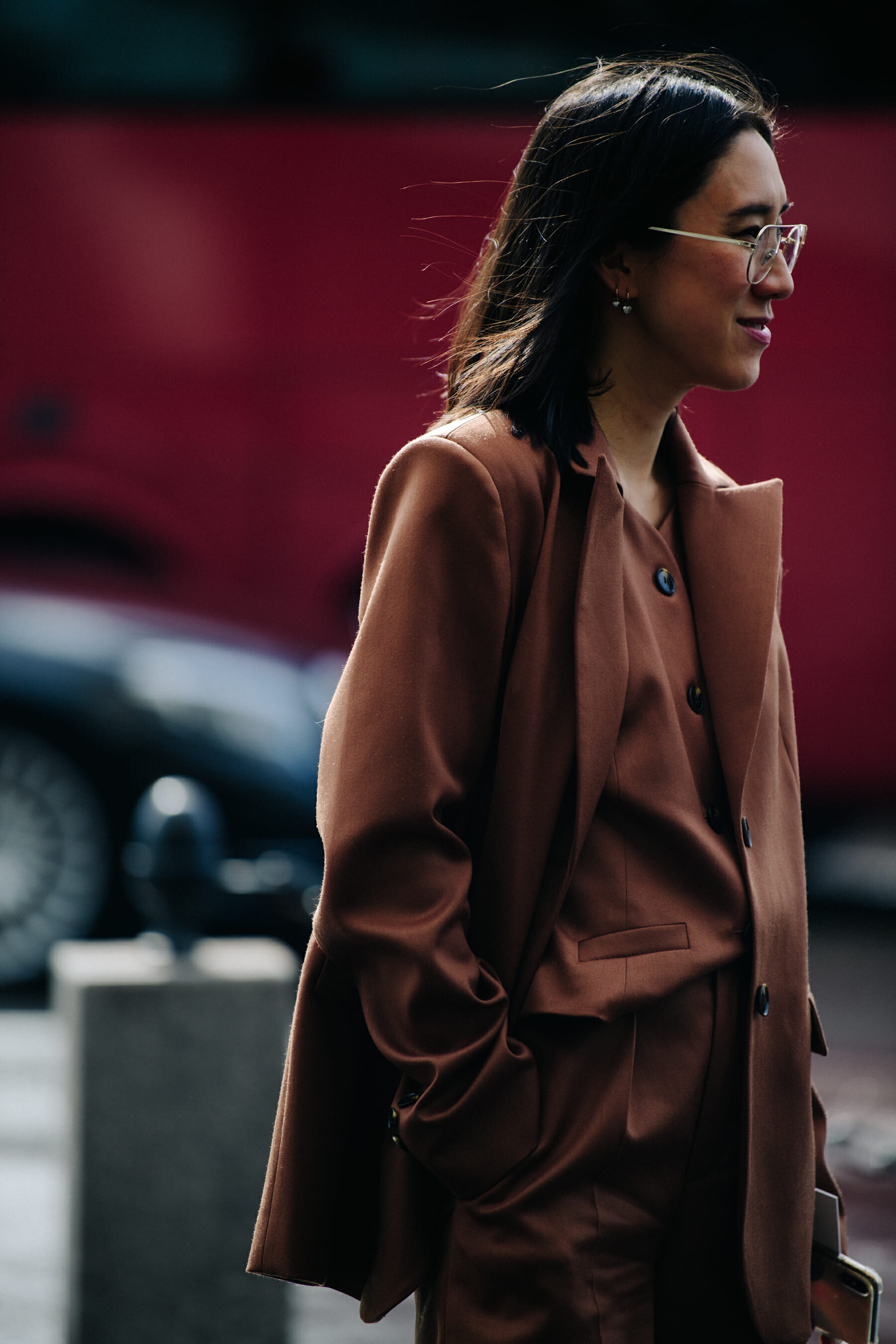Woman wearing brown suit