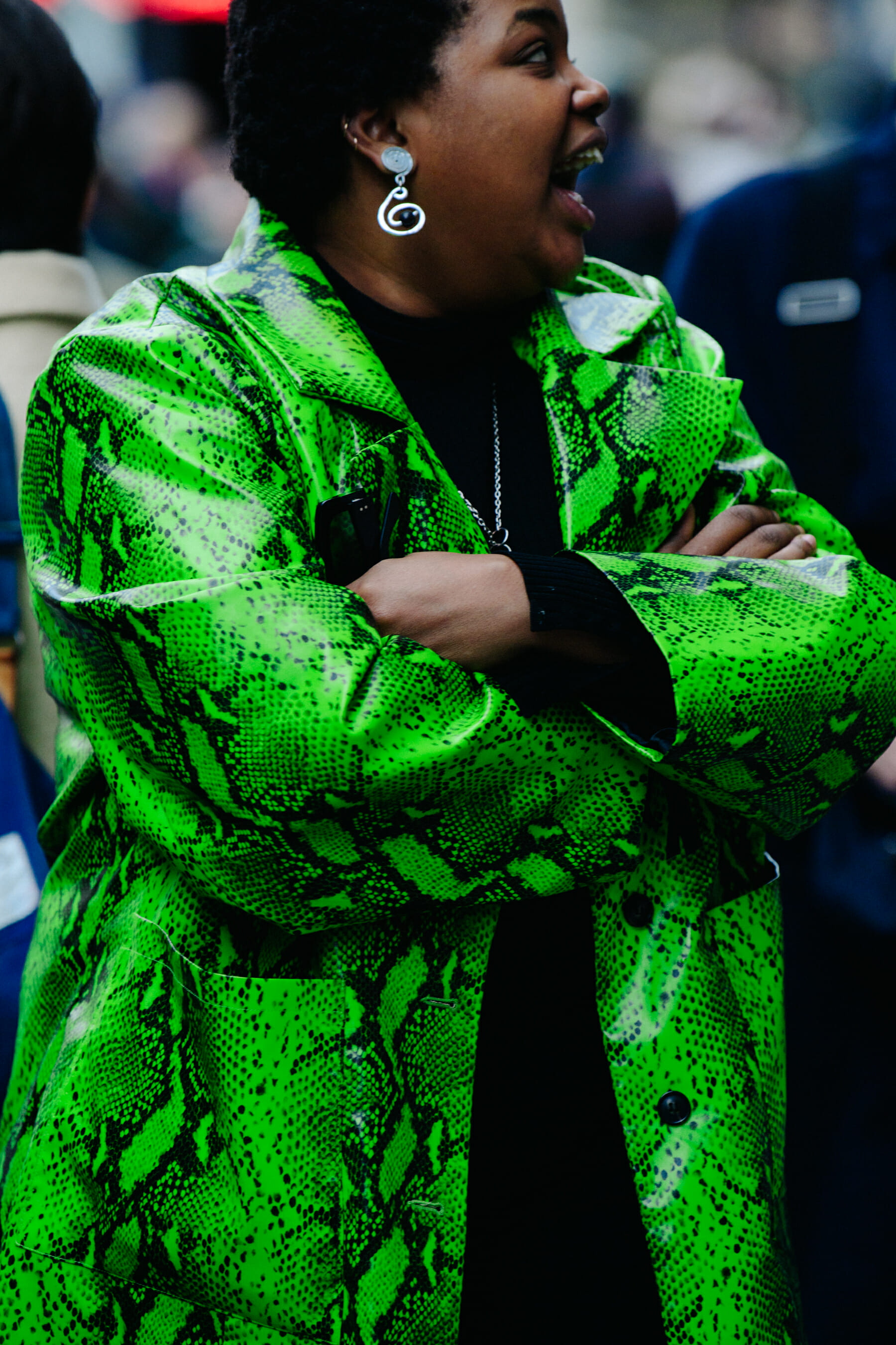 Woman wearing green jacket