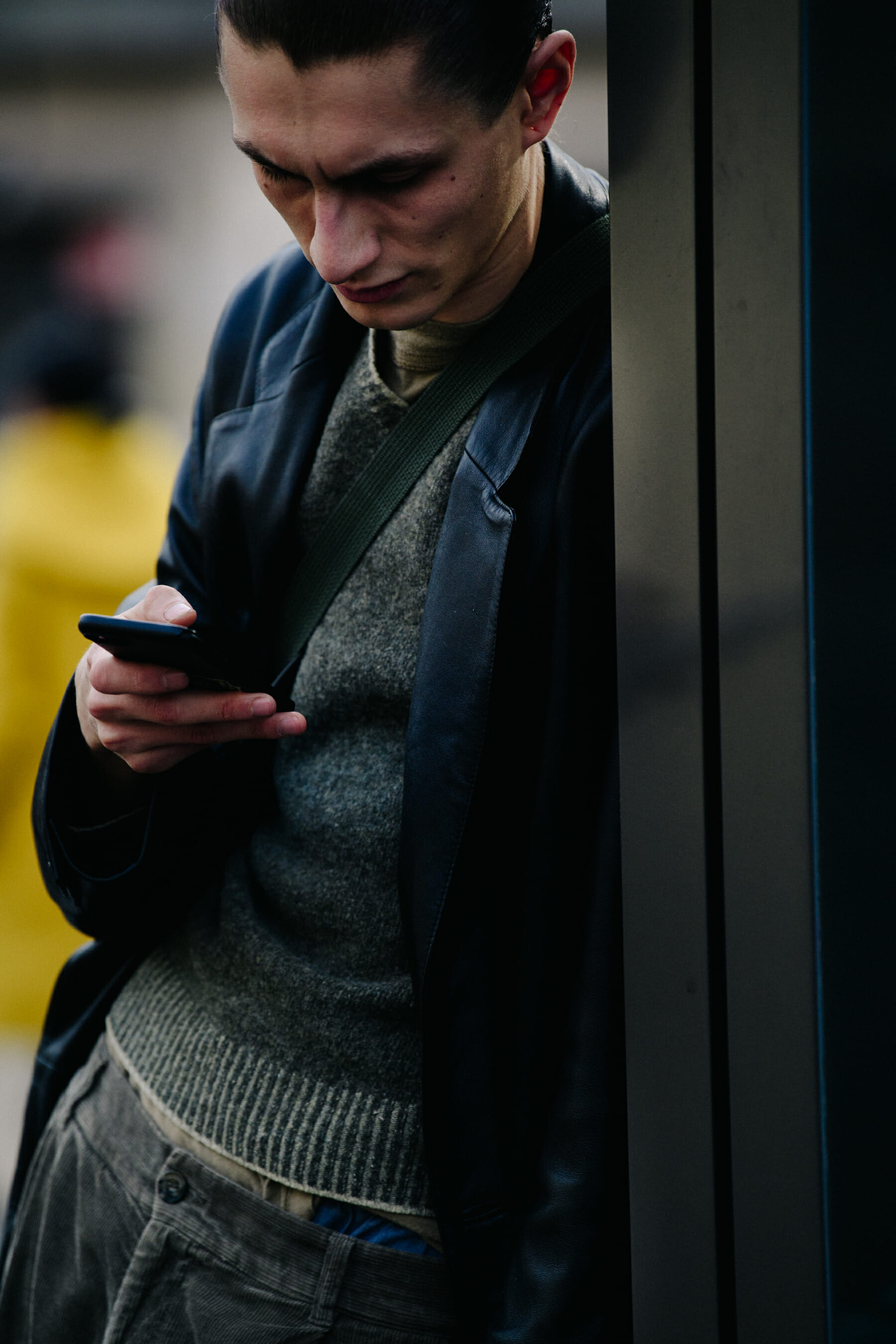 Model wearing dark wool jumper