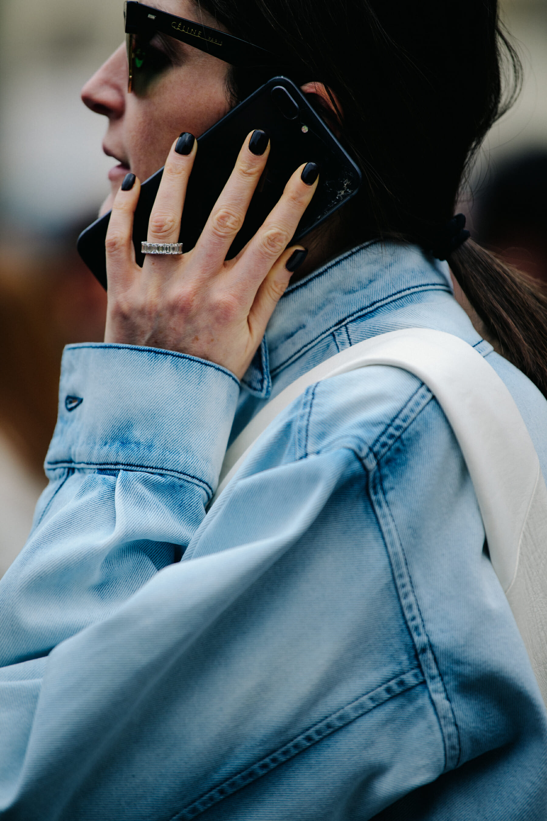 Woman wearing pale denim top