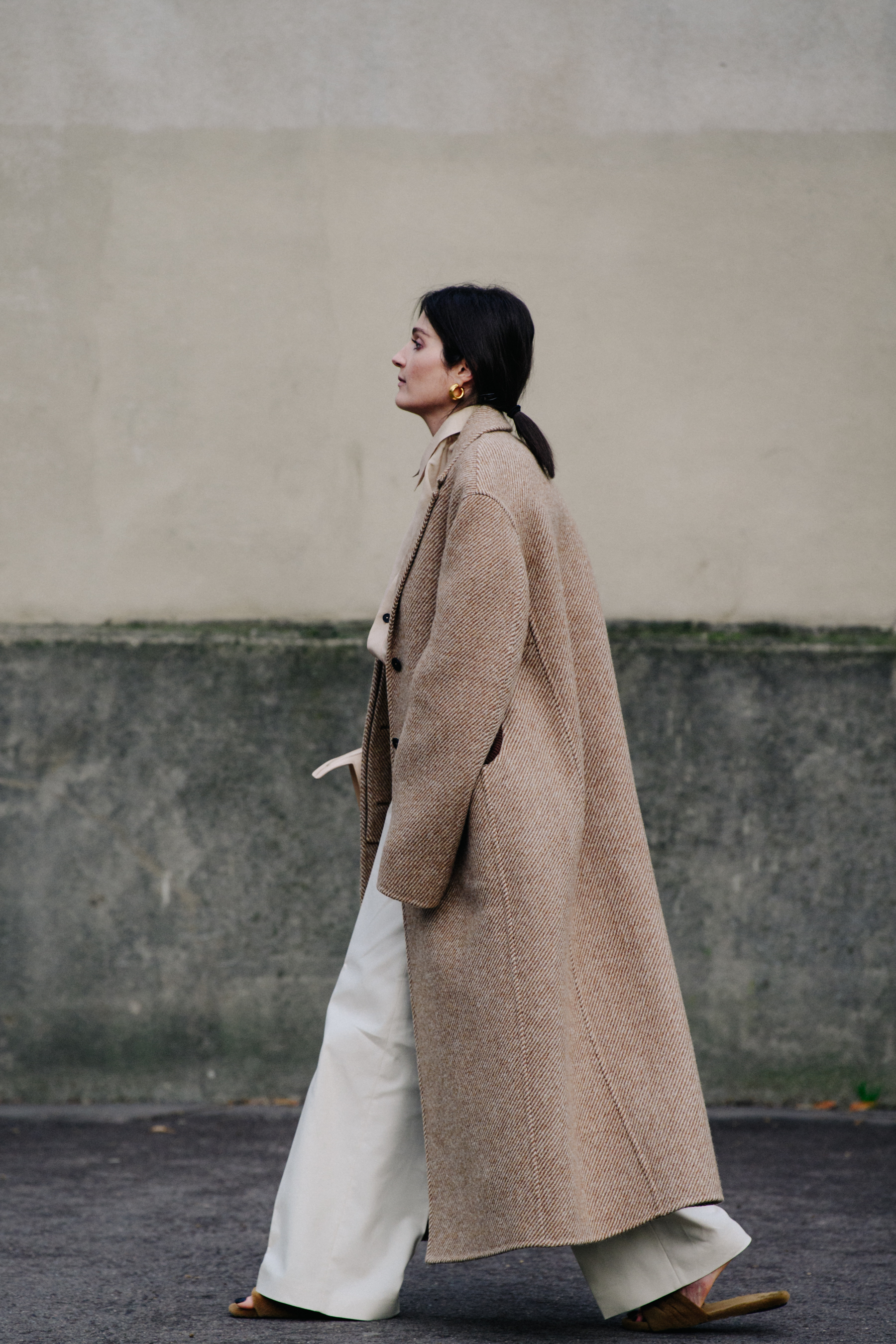 Woman wearing long wool coat