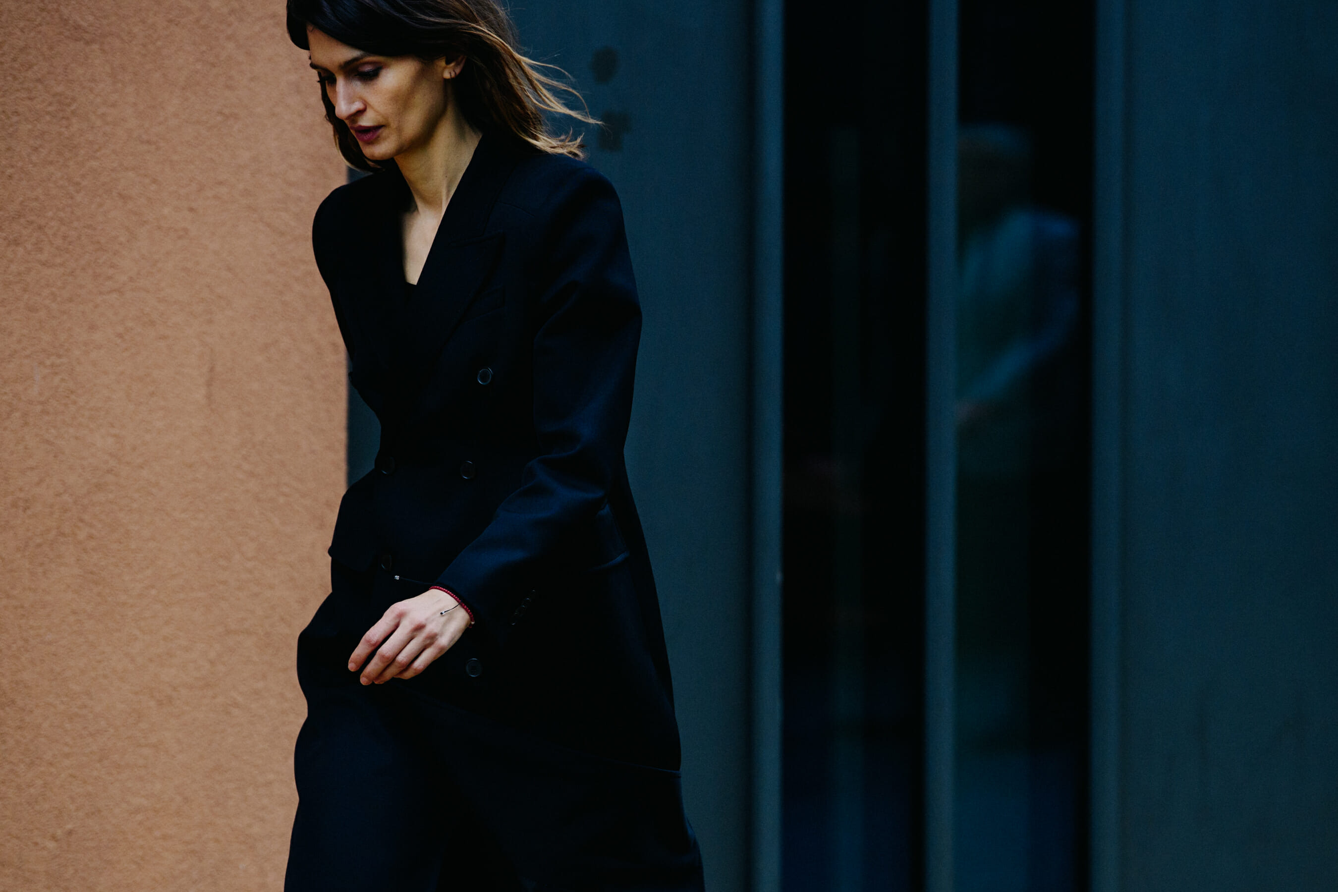 Woman wearing thick black coat