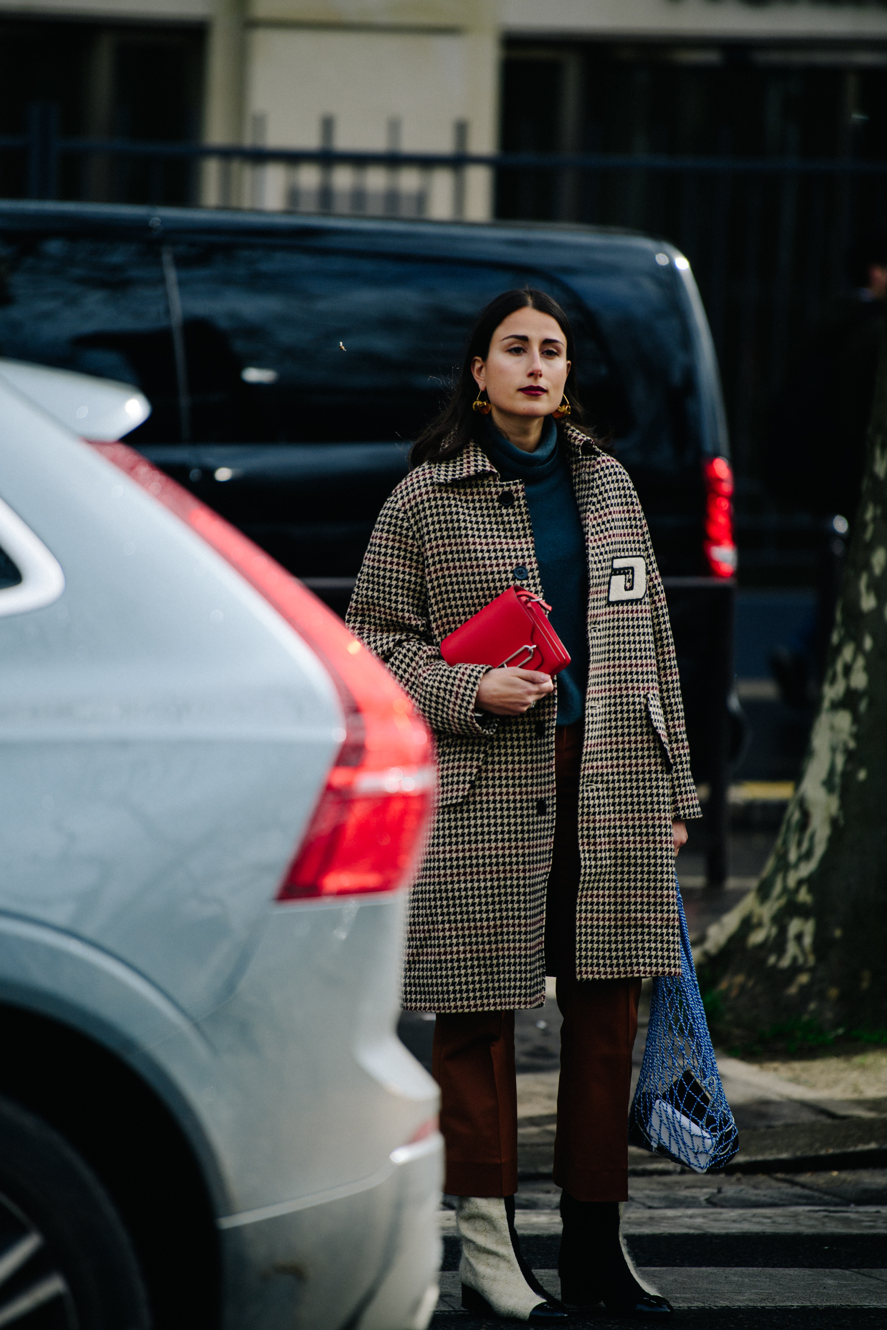 Woman wearing check wool coat