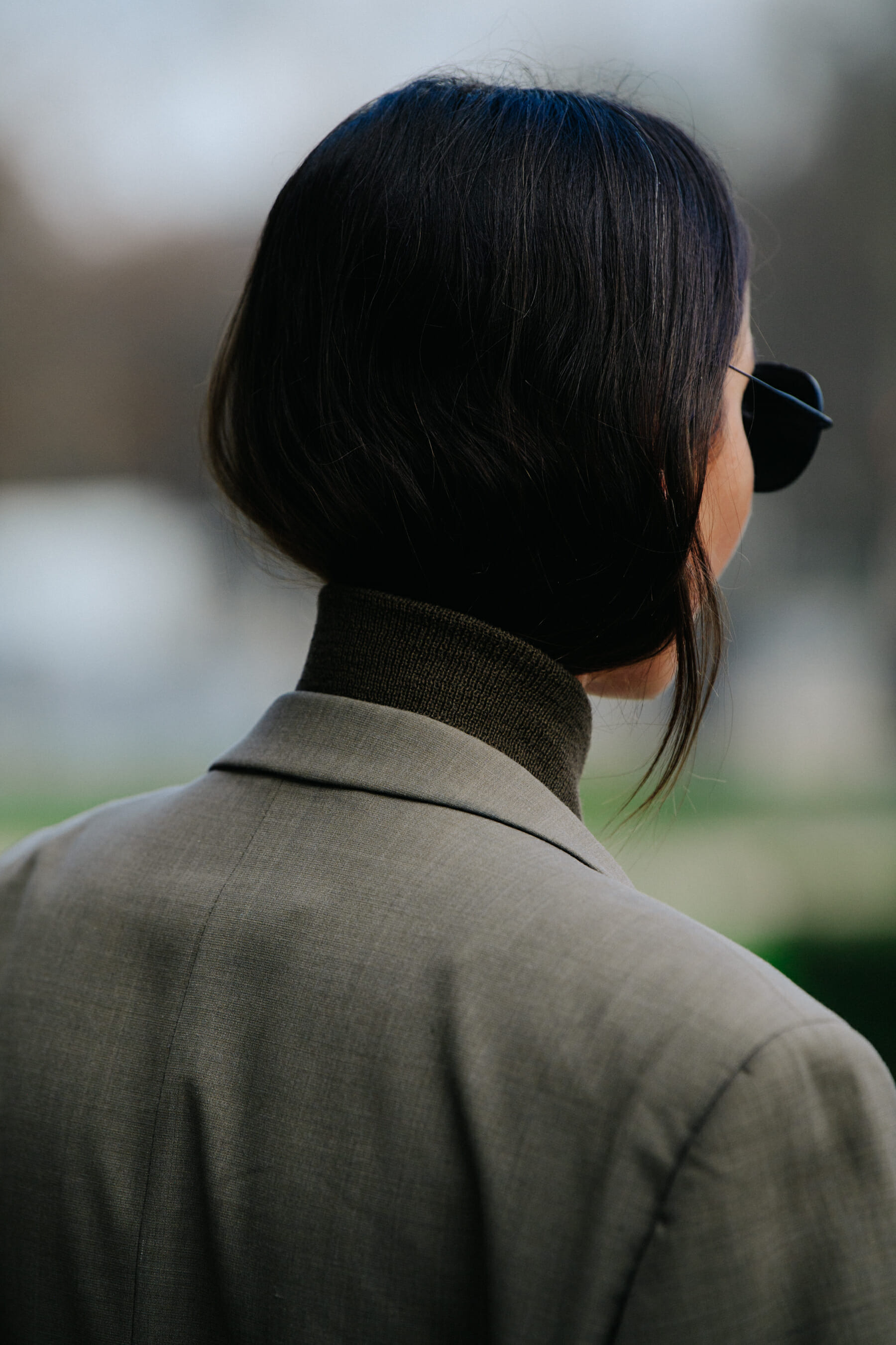 Woman wearing grey suit