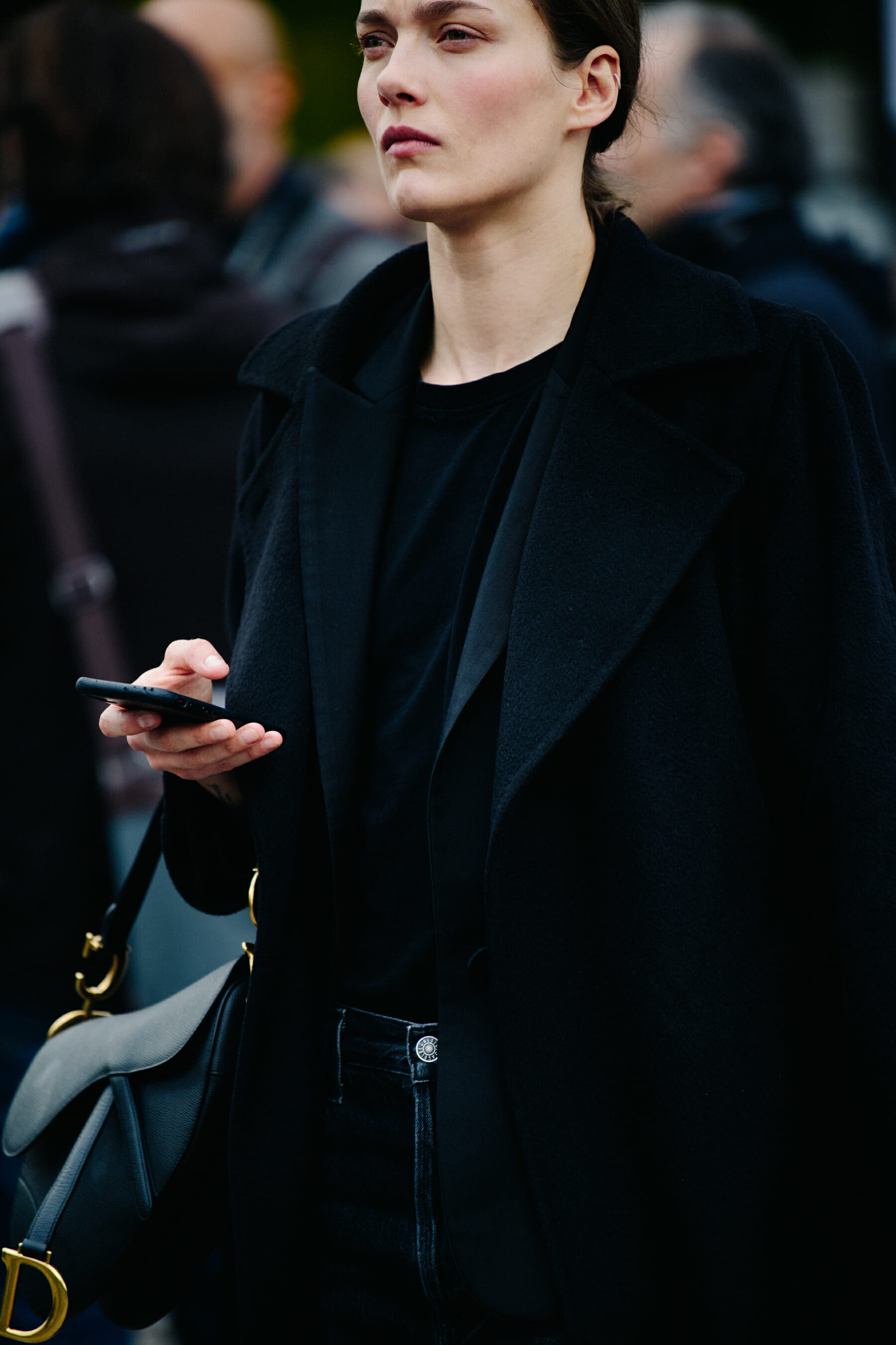 Woman wearing dark outift