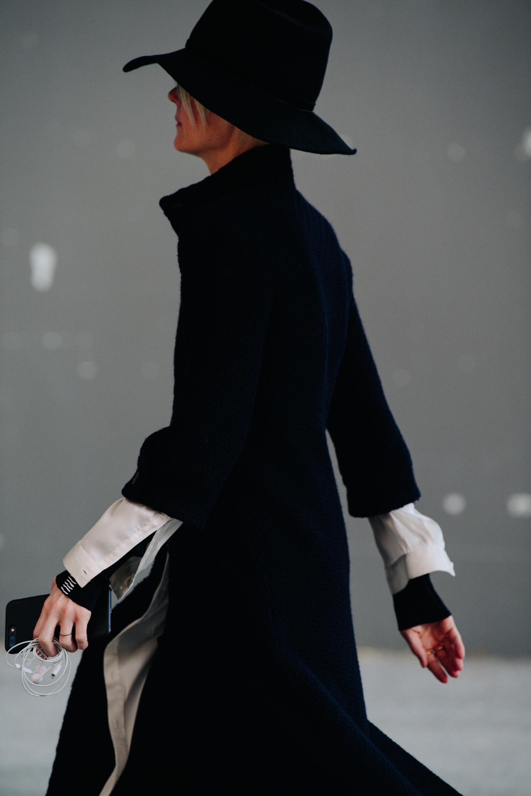 Woman wearing navy blue outfit