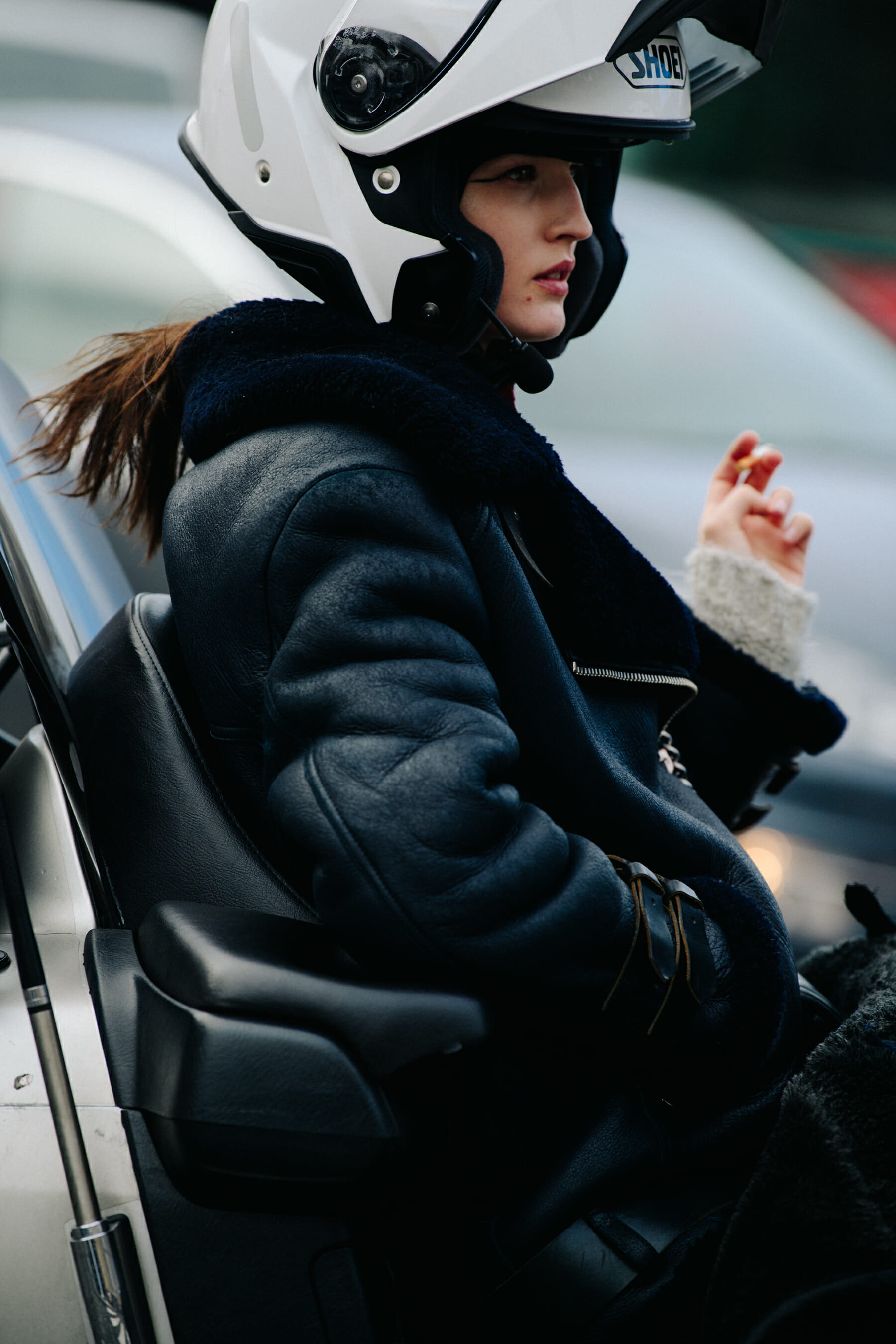 Model wearing black shearling jacket