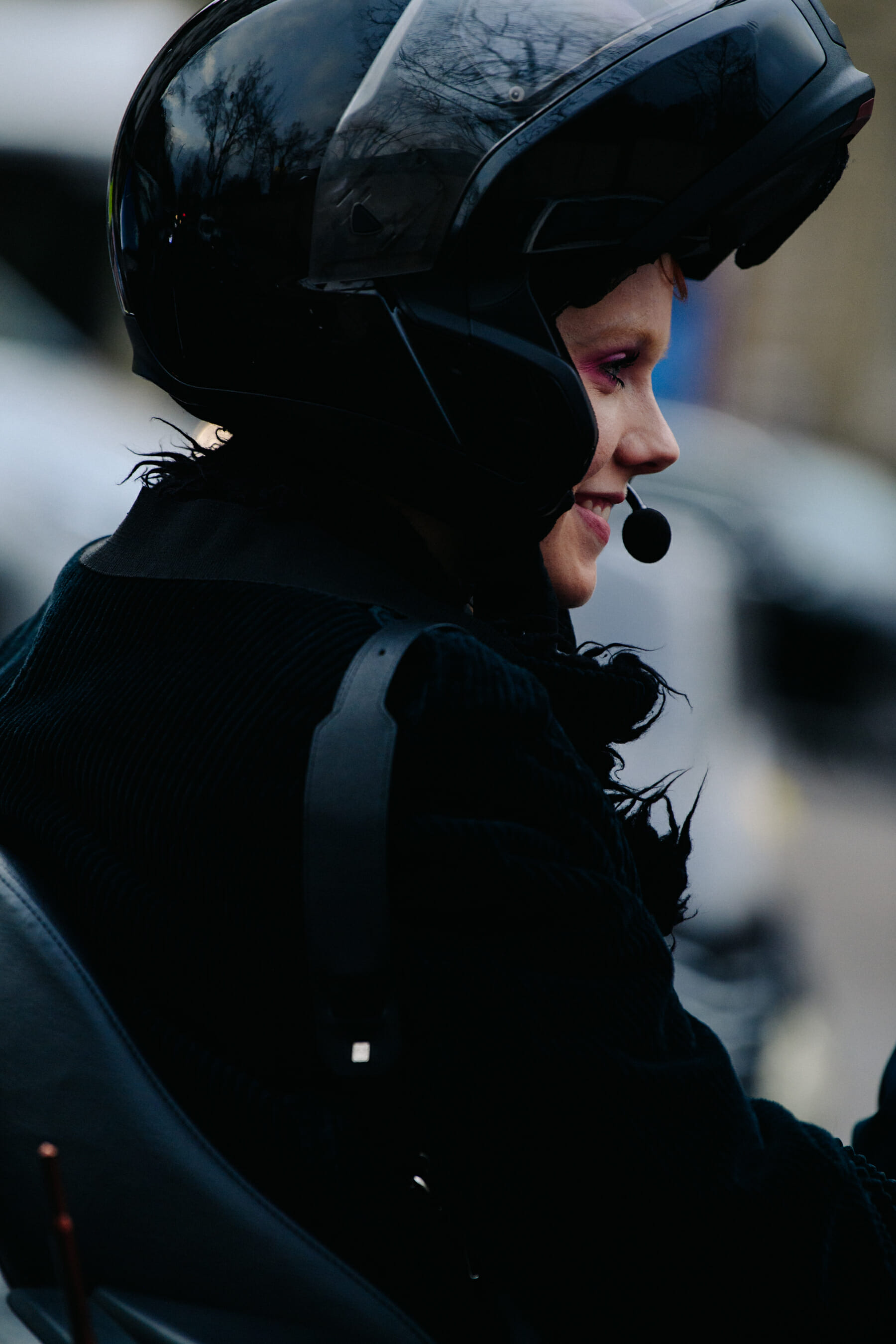Model wearing motorcycle helemt