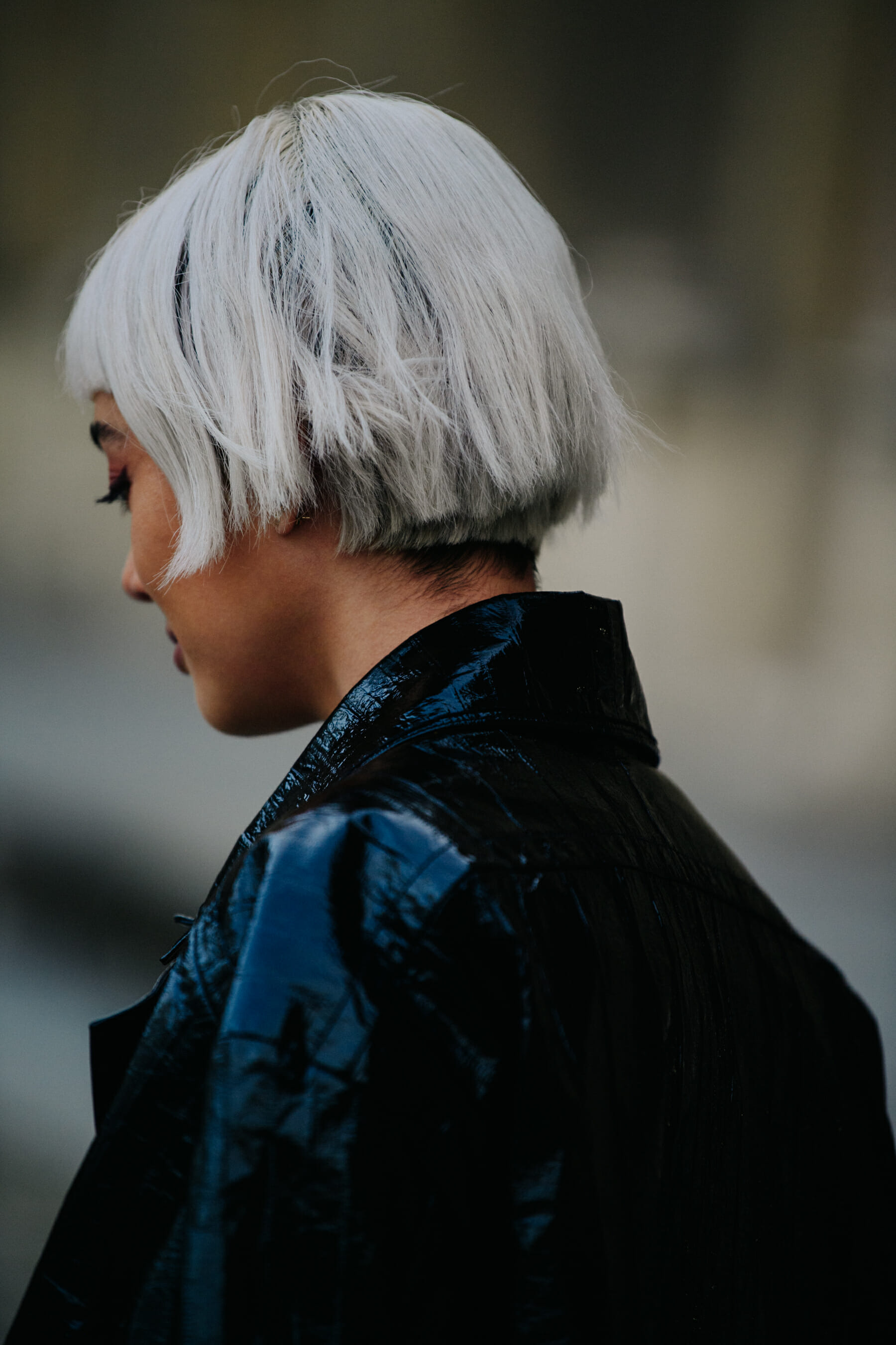 Woman with cropped grey hair