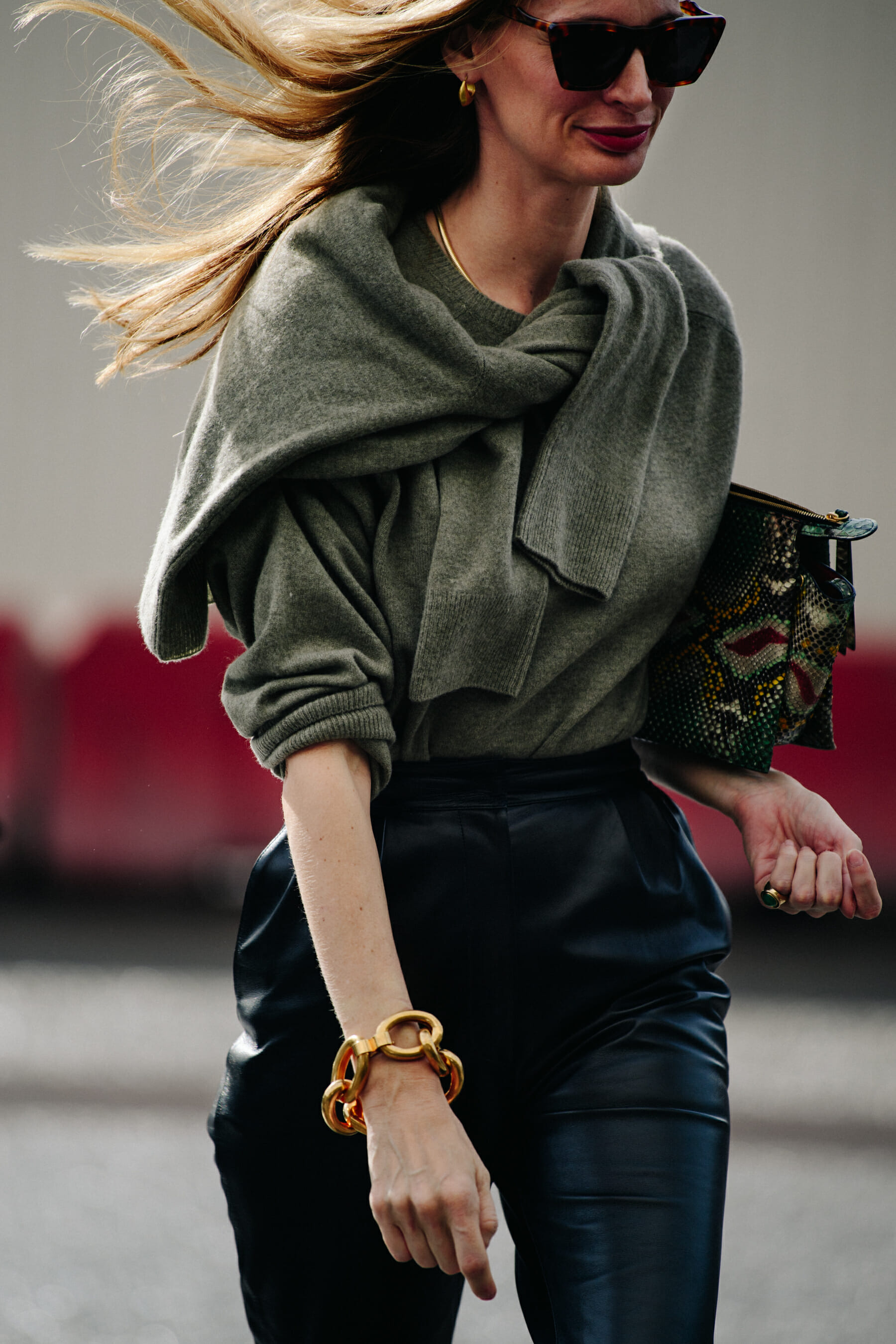 Woman wearing green jumper